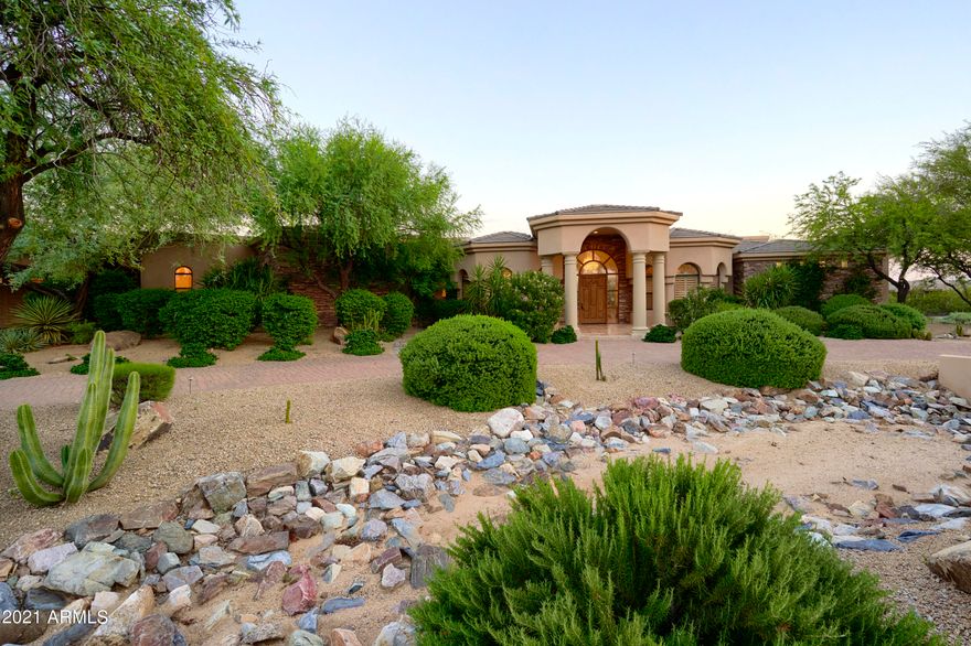 This gorgeous custom home features a split floorpan w/5 bedrooms plus den & home theater, 4.5 baths, formal living & dining rooms, and a 4 car garage that can be expanded to 6 cars! Seller has updated the majority of the home w/all new kitchen featuring new cabinets, quartz counters, custom tile backsplash, & Wolf/Subzero SS appliances which overlooks the large family room w/huge wet bar & fireplace. Master is next to office away from other bedrooms and features large soaking tub w/massive walking shower, newer porcelain floors that look like marble, chrome fixtures, and plus carpet. The home theater room is decked out w/the latest AV equipment and full theater seating.  Don't forget the back yard w/p-tec pool, spa, gazebo w/b-in bbq, & are grassy play area.  All on 1.5 acres w/south back