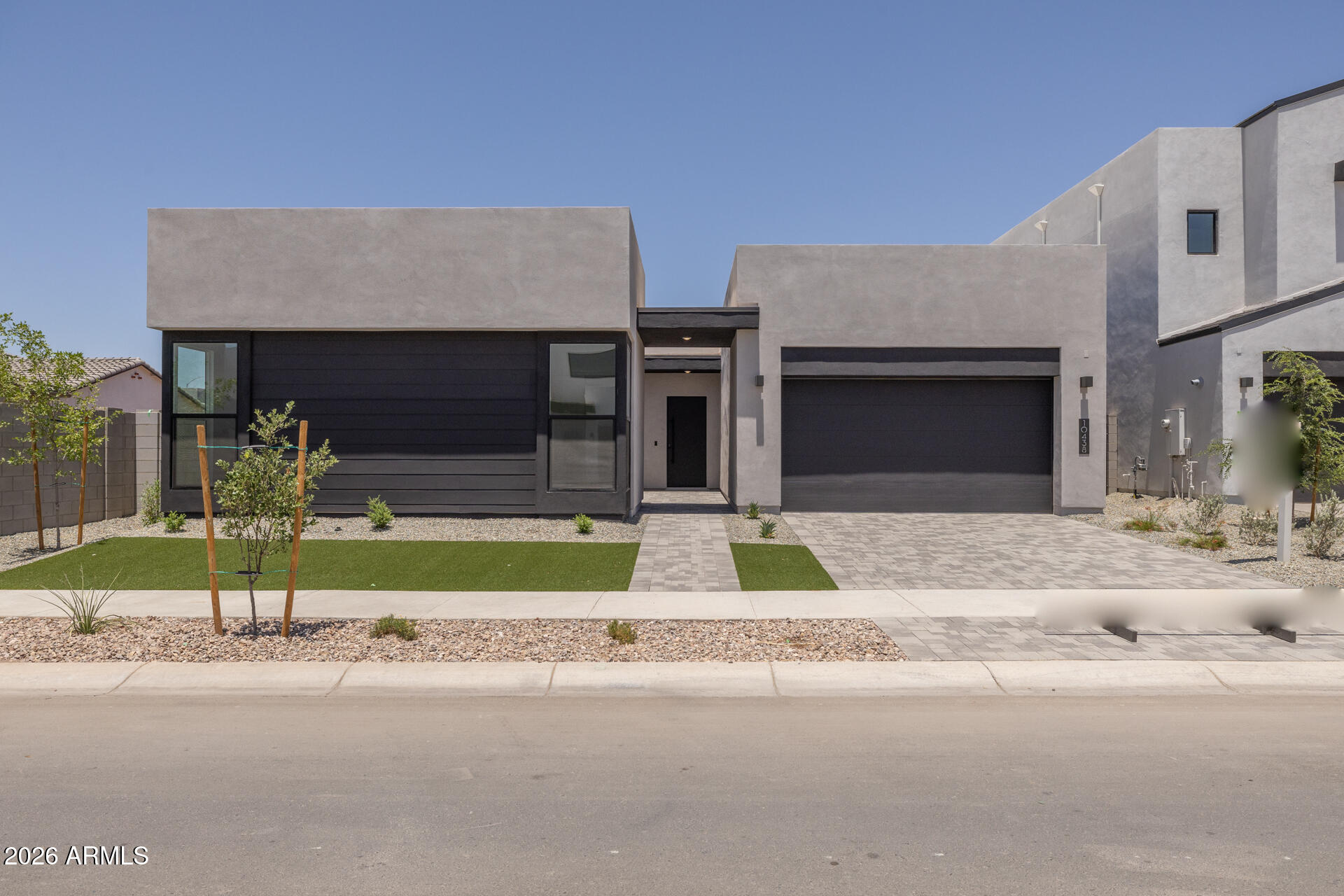 10438 E ULYSSES Avenue