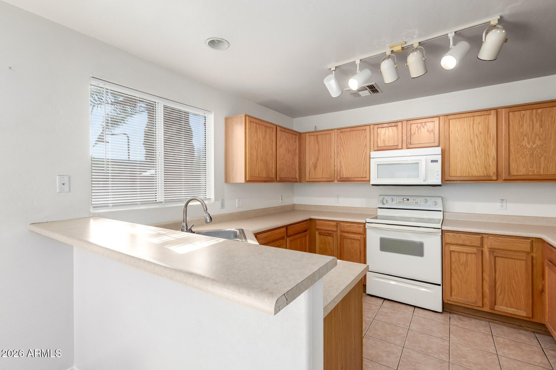 12933 W CHERRY HILLS Drive