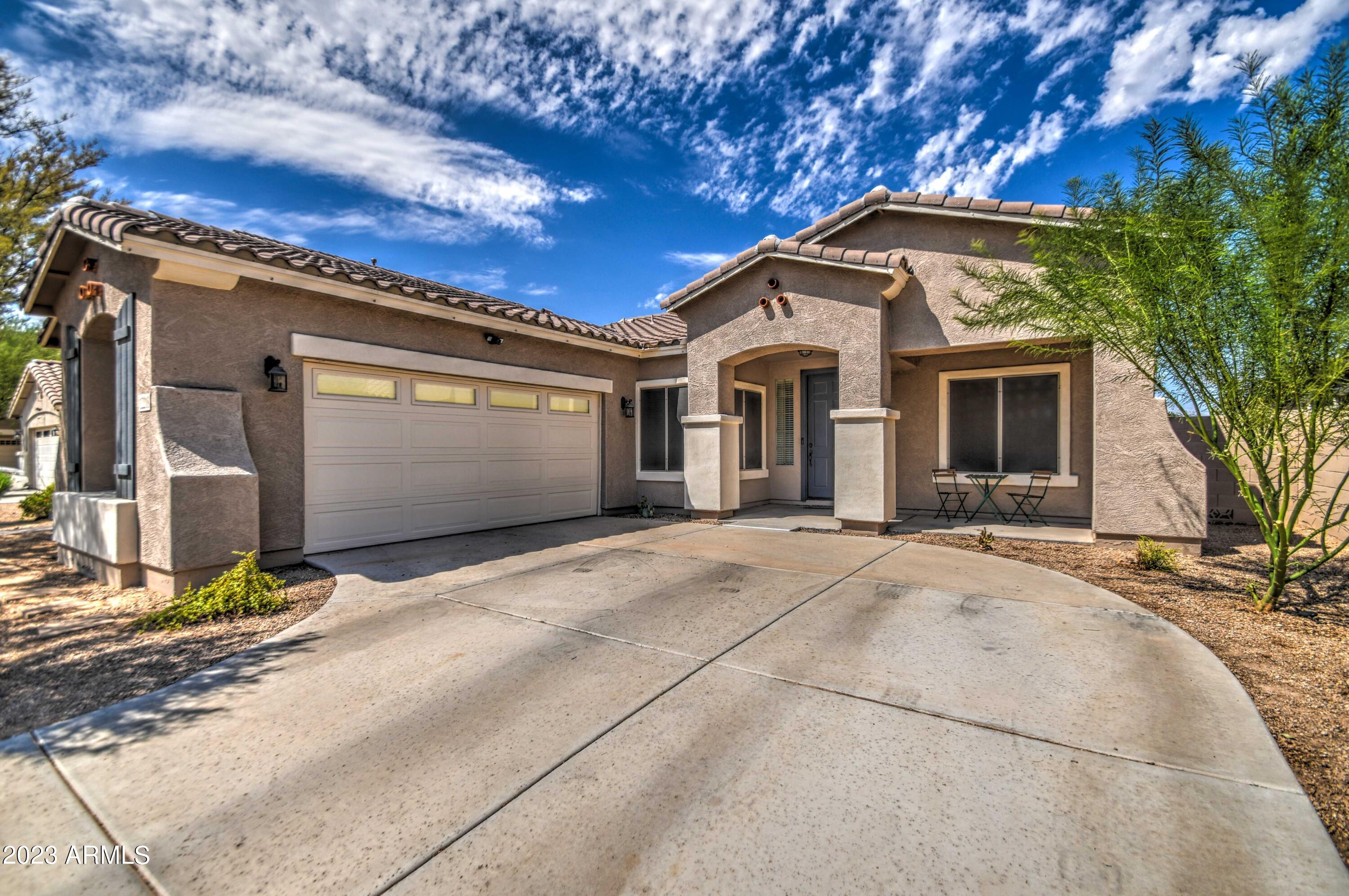 12218 W Calle Hermosa Lane