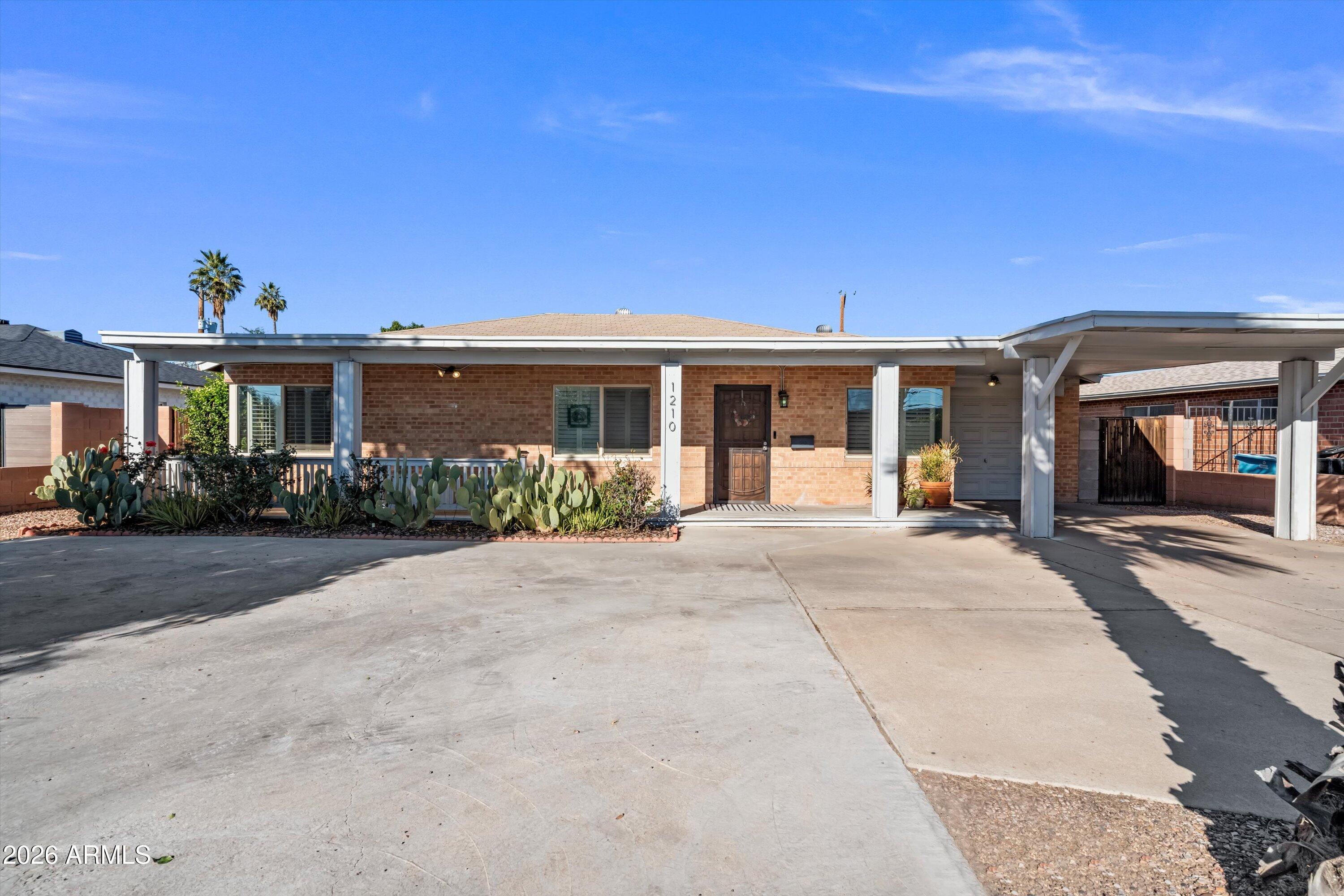 1210 W MISSOURI Avenue