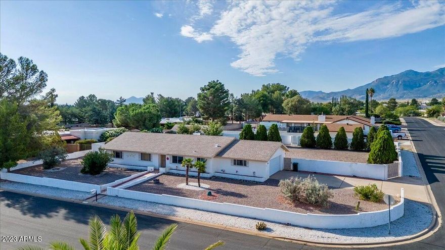 Pride of Ownership Home! Beautiful, updated 3 bedroom, 2 bathroom home that offers a 2.5 car attached garage (don't worry; it can fit your full size lifted truck!). Still need more room? There is a detached single car garage with an additional storage space available in the backyard! This spacious lot, centrally located in town, offers: RV gate, RV parking, mature apple tree, private pool, detached garage, large covered patio that has wonderful mountain views! Inside the home you will find fresh kitchen cabinets, new appliances, recessed lighting, fireplace, updated windows, recently replaced water heater, AC and furnace. No carpet. No HOA. No popcorn ceilings! So much to love! Check out this home; it is ready to be yours!