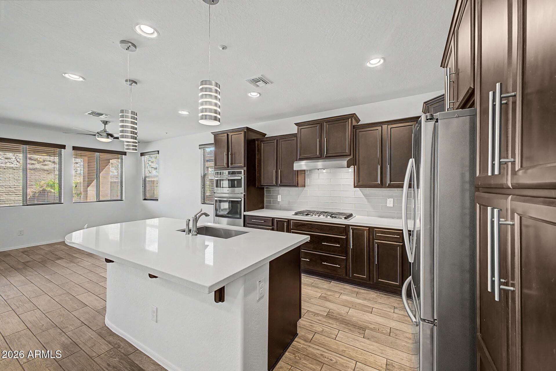 12728 W CARAVEO Place