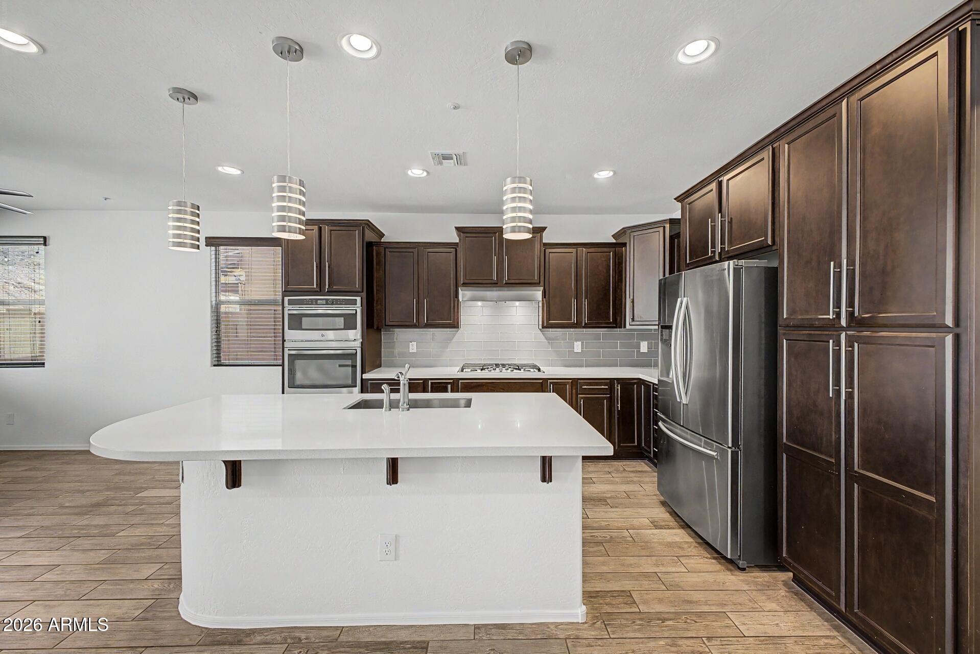 12728 W CARAVEO Place