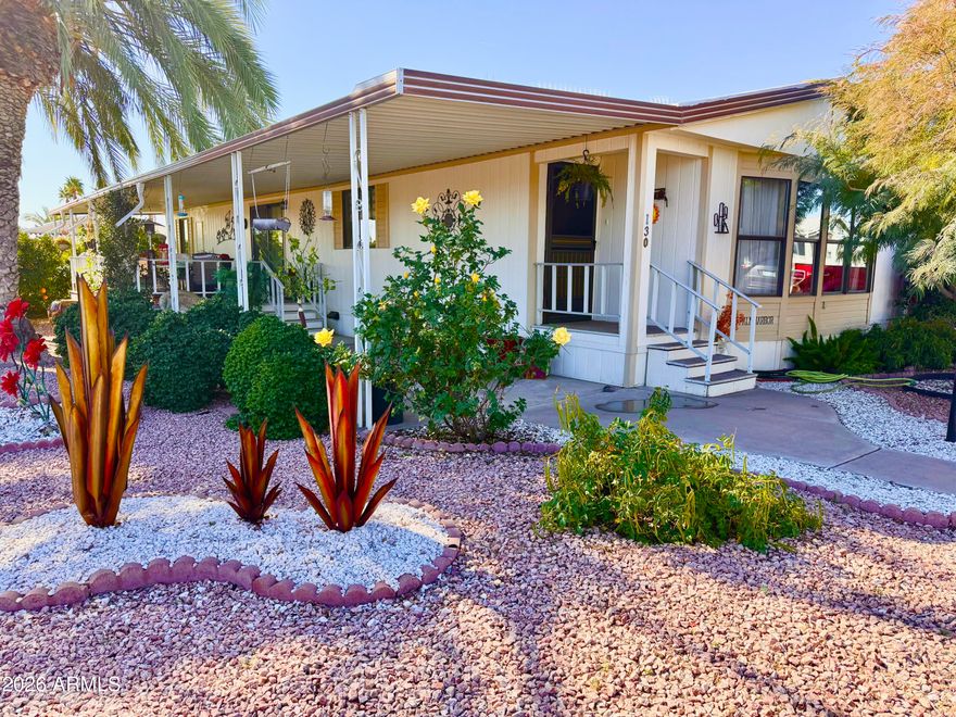 Welcome home to your beautiful oasis in Ellsworth Springs! This custom, fully furnished, double wide, 2 bedroom 2 bath, private corner lot home provides natural landscaping creating a serene, private escape. This exceptionally cared for property includes a new AC unit, updated flooring in the family room, kitchen, dining room and laundry room, as well as an expanded kitchen island with a new, butcher block counter top. With space to park two+ vehicles on the extended covered carport, you can sit back and relax while enjoying a cup of coffee on your quiet, peaceful, large deck or head over to the club house and take a swim in the heated community pool. There are many activities within the community or take a short drive for additional entertainment, shopping and restaurants.