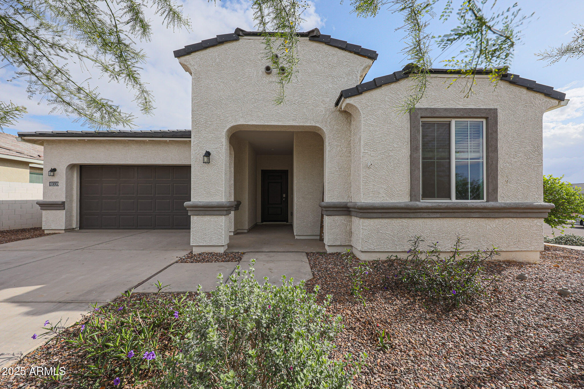 10339 W TAMARISK Avenue