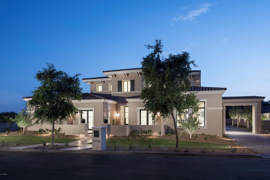 CONSTRUCTION COMPLETE - The Arcadia neighborhood in Silverleaf is one of the most sought after locations in the Valley and this newly completed home is one not to be missed. The team of GCW Builders and Kristin Hazen Design thoughtfully crafted this 6,000 square foot, 4 bedroom (plus office) and 4.5 bath Modern Mediterranean style home, with high quality finishes (Calacatta marble, European oak, limestone accents throughout) and design style that are sophisticated yet casual. The great room floor plan seamlessly opens to the covered patios for that desired indoor/outdoor living that is perfect for both family living (Wolf, Subzero, Asko appliances) and entertaining.