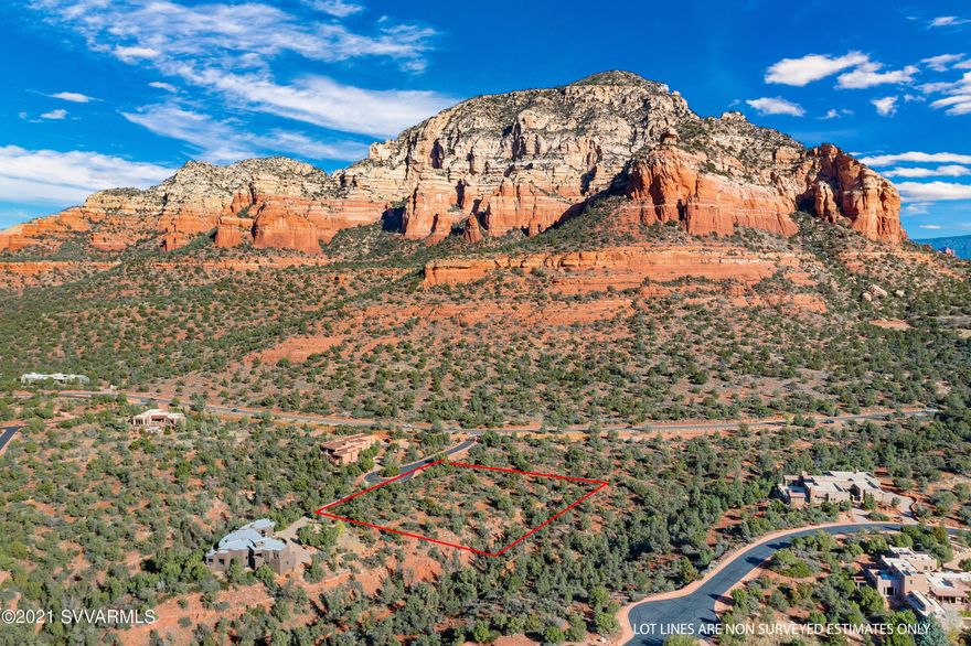 Superior VIEWS and the ''elbow space'' you've been craving! This 2.25 acre vacant lot provides a serene blank canvas for your new Sedona Estate. Rare location captures both Sunrise & Sunset ''Golden Hours'' in Sedona. Premium cul-de-sac location in luxury gated community. This elevated, flat building site is perfect for an easy build with astounding views in every direction. Best of both worlds! ''Up close & personal'' views of Thunder Mountain/Lizard Head, and panoramic views of Boyton Canyon, Doe Mountain, Bear Mountain, Cockscomb, etc. Best location in West Sedona - minutes to abundant hiking/biking trails, Seven Canyons Golf Club, and all of Sedona amenities. Close proximity to everything allows you to take advantage of the unique outdoor activities that make Sedona the best place to