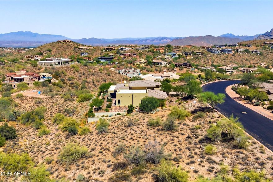 Build your custom desert sanctuary behind the prestigious guard gates of FireRock Country Club. Set on an elevated, highly buildable envelope with ideal North/South exposure, this premium homesite offers an unmatched canvas for your architectural vision. The panoramic sightlines are spectacular, boasting sweeping, unobstructed vistas of Four Peaks, the McDowell Mountains, and the Mazatzal range. Beyond the world-class golf and clubhouse dining in your own backyard, this location offers ultimate convenience. A straight, 10-minute drive down Shea Boulevard puts you at the world-renowned Mayo Clinic just 3 miles away, right next to the nationally acclaimed BASIS Scottsdale campus. You are also less than two miles from everyday essentials like Starbucks and Safeway, and just 2.5 miles from Fountain Park. With McDowell Mountain Regional Park just minutes away and Scottsdale Airport a quick 16-mile drive, this property perfectly bridges the gap between serene desert seclusion and elite city convenience.