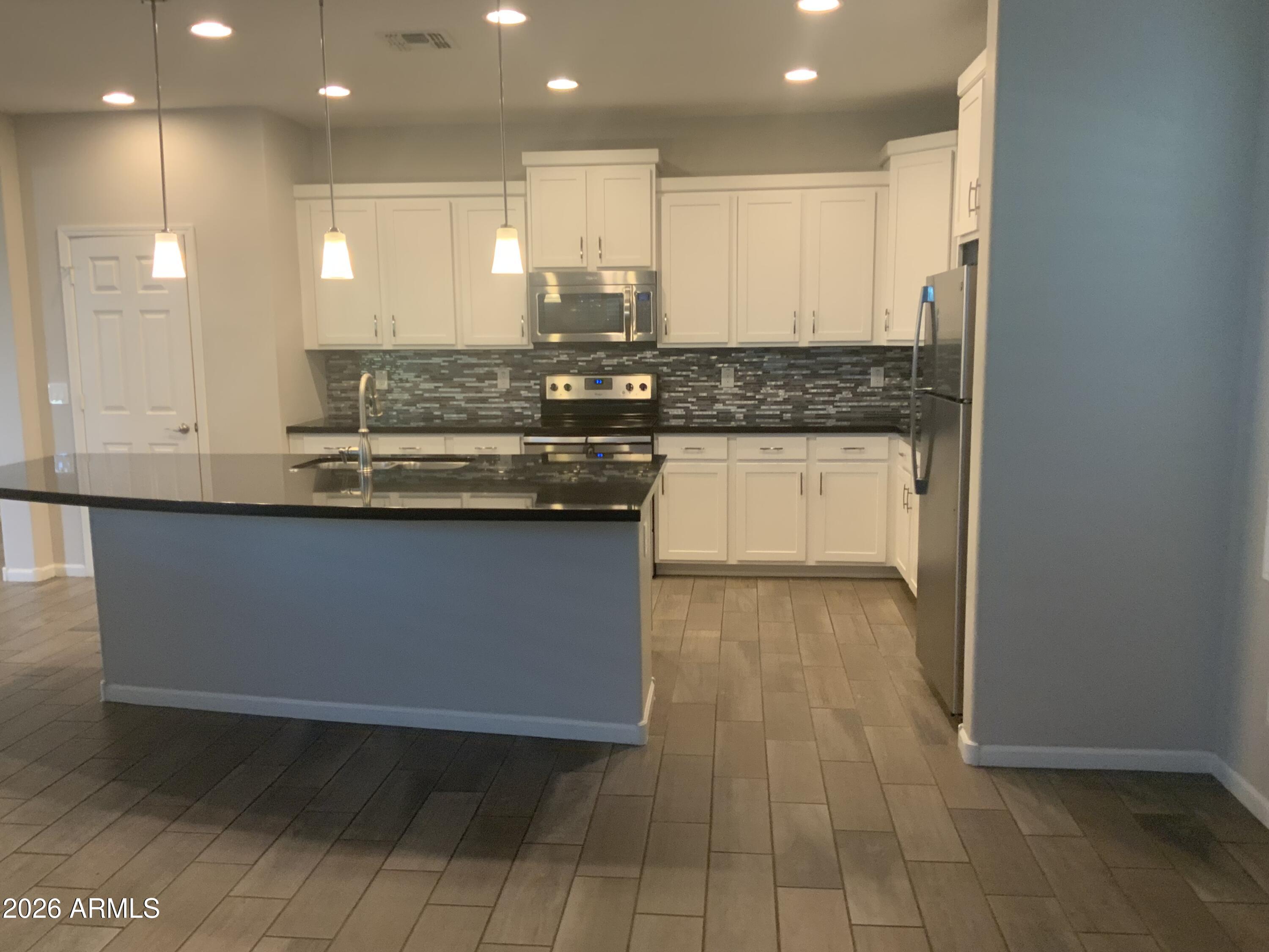 12141 W DESERT MOON Way