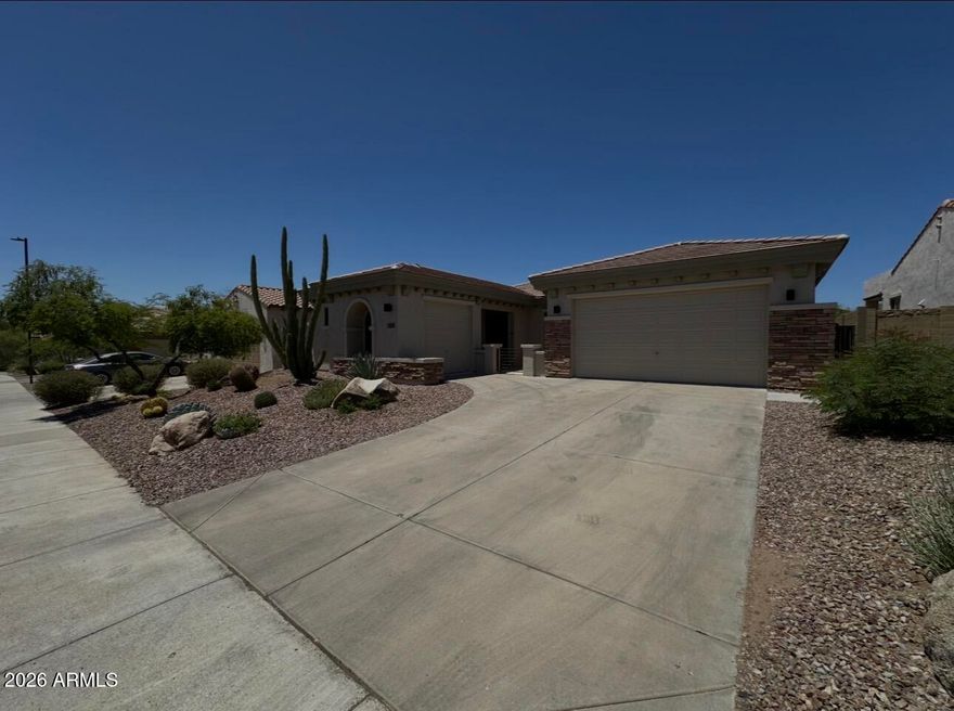 Welcome to Anthem living at its finest! This beautifully updated 5 bedroom, 3 bathroom home offers an entertaining floorplan with both formal living and family rooms, creating the perfect balance of comfort and functionality. Situated on a premium lot, the low maintenance backyard provides space to relax and enjoy Arizona living without the upkeep. The spacious kitchen opens seamlessly to the main living areas, while the updated primary bathroom and numerous upgrades throughout add modern style and convenience. A front courtyard creates charming curb appeal, and the 3 car garage offers plenty of storage and parking. Major updates include a new roof and exterior paint completed in 2026. Enjoy living in one of the area's most sought-after master-planned communities featuring resort-style pools, fitness center, water park, fishing lake, sports courts, walking trails, playgrounds, community events, and the expansive 63-acre Community Park.