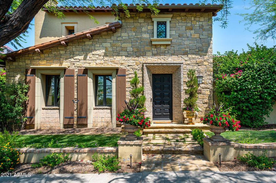 This beautiful home is located on a private corner lot within The Parks neighborhood of the prestigious Silverleaf community. This exquisite home has gorgeous mountain, features lush outdoor spaces that offers a garden experience, and wonderful intimate living areas. Richly appointed wood interior finishes from the moment you enter the front door. Extensive wood flooring through main living area, gourmet custom finishes in the kitchen with Butler's pantry, wine refrigerator/drawers, double islands and breakfast nook. Intimate family room with dual sided fireplace that leads to the library. The spacious yard area feels like an English garden, with lush landscaping, pool and spa, water feature, covered patios and built-in BBQ. This home is a Must See! Call for appointment! Owner's retreat has it's own sitting room perfect for the second office or exercise area, bedroom has views to the mountains. Guest bedrooms are spacious and feature walk-in closets. Theater room could be used as a play room or 6th bedroom. Guest casita above the third car garage is great for the college student home on break.