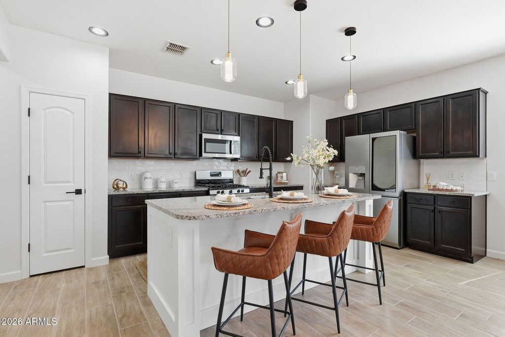 Photo of 41199 W Ganley Way, Maricopa, AZ 85138 (MLS # 7032472)