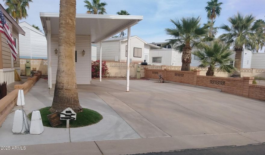 Nicely update RV lot in a 55+ golf course community. All utilities included, shed with washer/dryer and room to park the largest motor coach or RV! Available for sale is a 2015 DRV Mobile Suite Memphis 44 Model. 44 ft top of the line 5th wheel with 4 slide outs, king size bedroom, cedar lined closet, new walk-in shower, washer/dryer and 100 Gallon water capacity, 2 large awnings, center island kitchen, dish washer, 3 Ac's, vinyl plank flooring and a long list of other luxury upgrades!