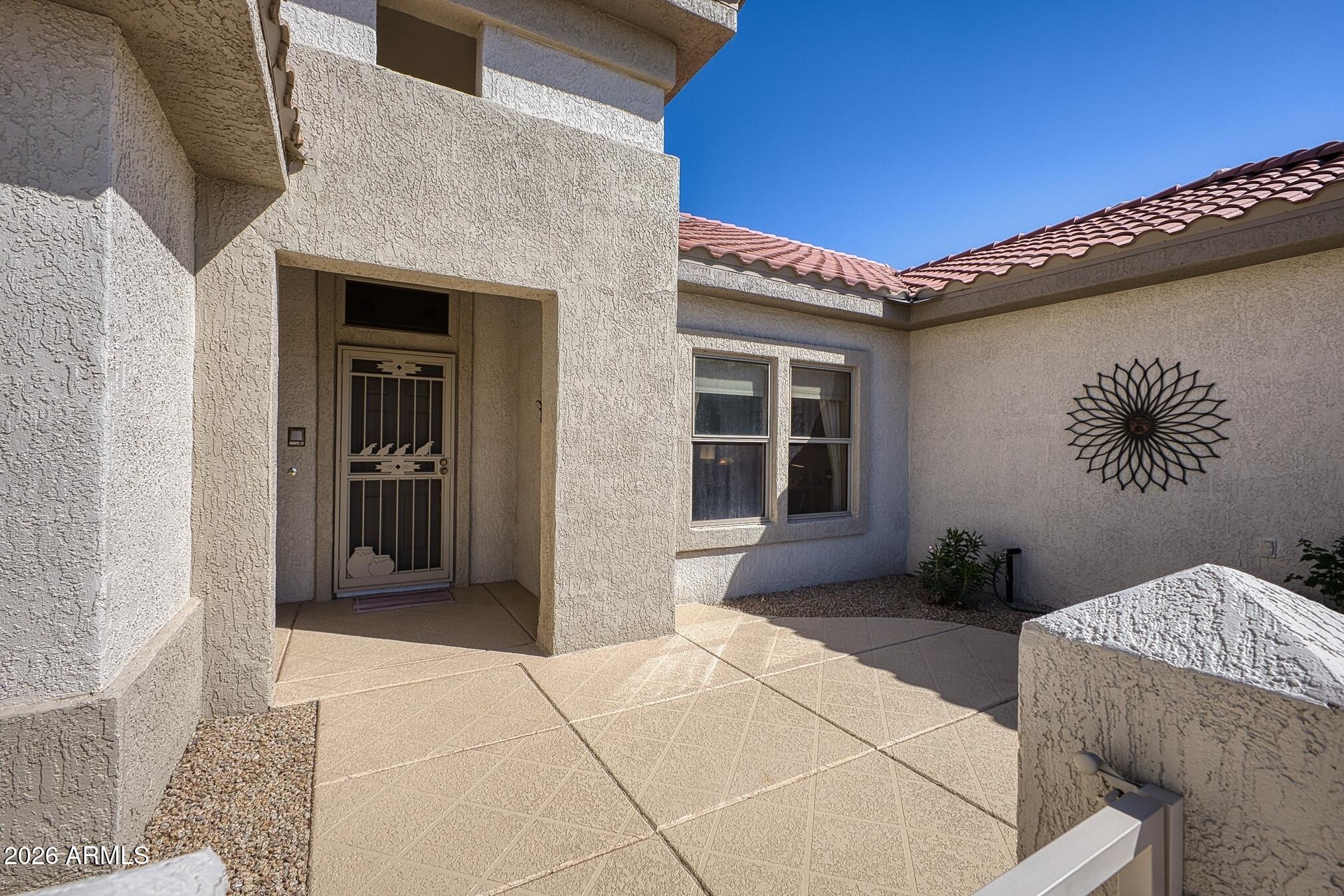 16438 W DESERT WREN Court