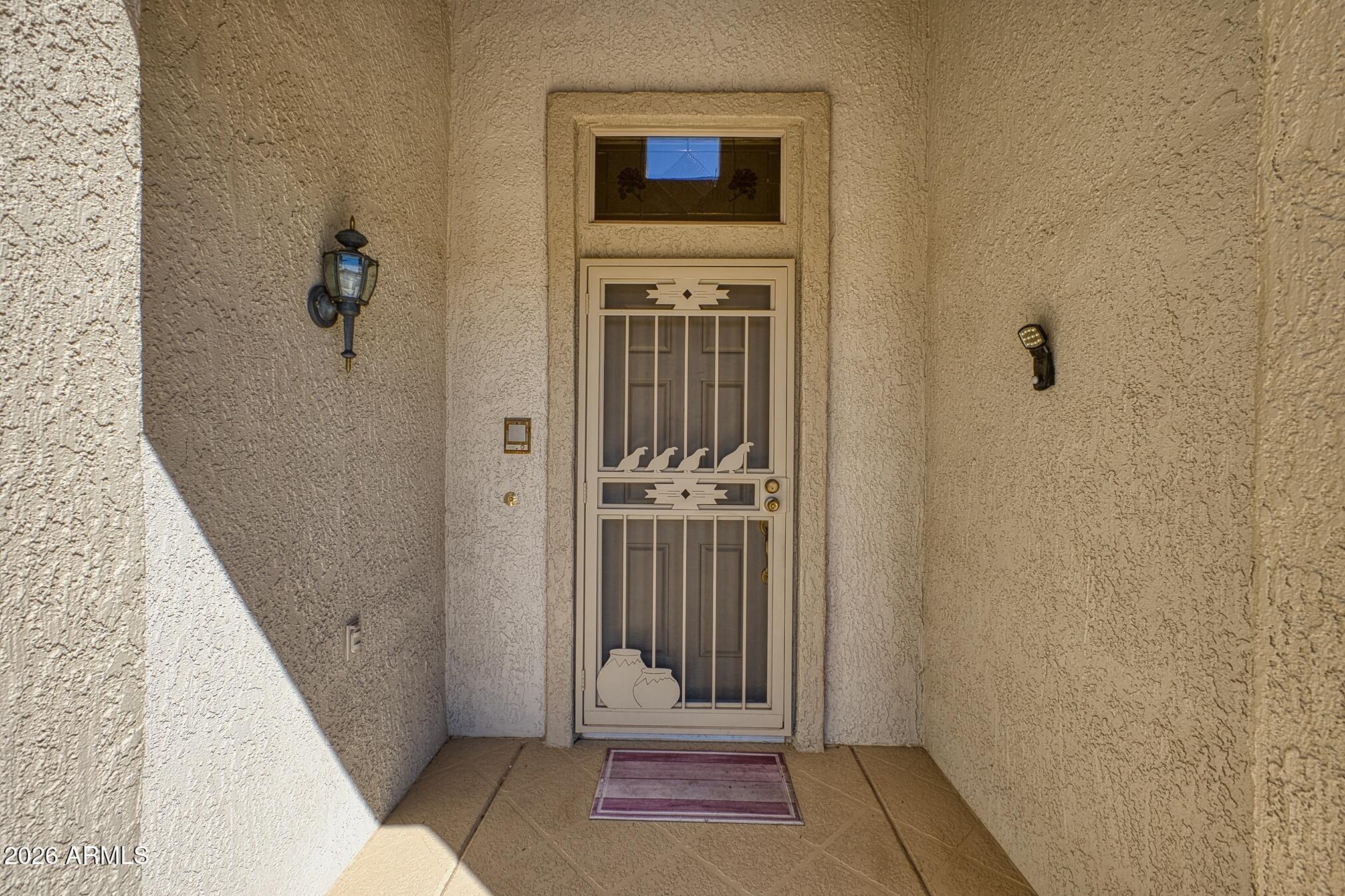 16438 W DESERT WREN Court
