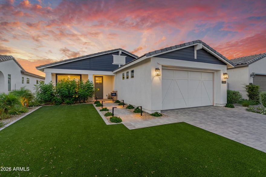 Why wait for vacation when you can live it every single day?

One of this homeowner's favorite traditions has been Wine Wednesday, where neighbors gather, unwind, share stories, and build genuine friendships over a glass of wine as the Arizona sun begins to set. It's the kind of authentic connection and community people are craving more than ever. Here, neighbors truly become friends.

Welcome to Sterling Grove's, the West Valley's premier lifestyle community, where luxury, connection, and wellness come together in one of the most sought after gated destinations. Surrounded by lush landscaping, mountain views and anchored by a stunning Nicklaus Design golf course, Sterling Grove was designed for those who want more than just a beautiful home. Buyers are drawn here for the lifestyle, the friendships, and the sense of belonging that's hard to find today.

The home was thoughtfully designed to extend that same sense of peace and connection beyond its walls. More than $100,000 has been invested in creating a backyard sanctuary where the boundaries between indoor and outdoor living seem to disappear. A stunning custom water feature serves as the centerpiece, filling the space with the soothing sounds of flowing water and creating a tranquil ambiance that can be enjoyed both inside the home and throughout the backyard retreat.

Whether enjoying a quiet morning coffee, hosting friends for sunset conversations, or simply listening to the calming sound of flowing water after a long day, this backyard delivers the kind of everyday luxury that makes home feel special.

Beyond your front door, Sterling Grove offers an unmatched resort inspired lifestyle with championship golf, pickleball, fitness classes, walking trails, resort pools, spa amenities, on site dining, social clubs, live events, and countless opportunities to stay active and engaged.

This is more than a home. It's the next chapter buyers have been waiting for.