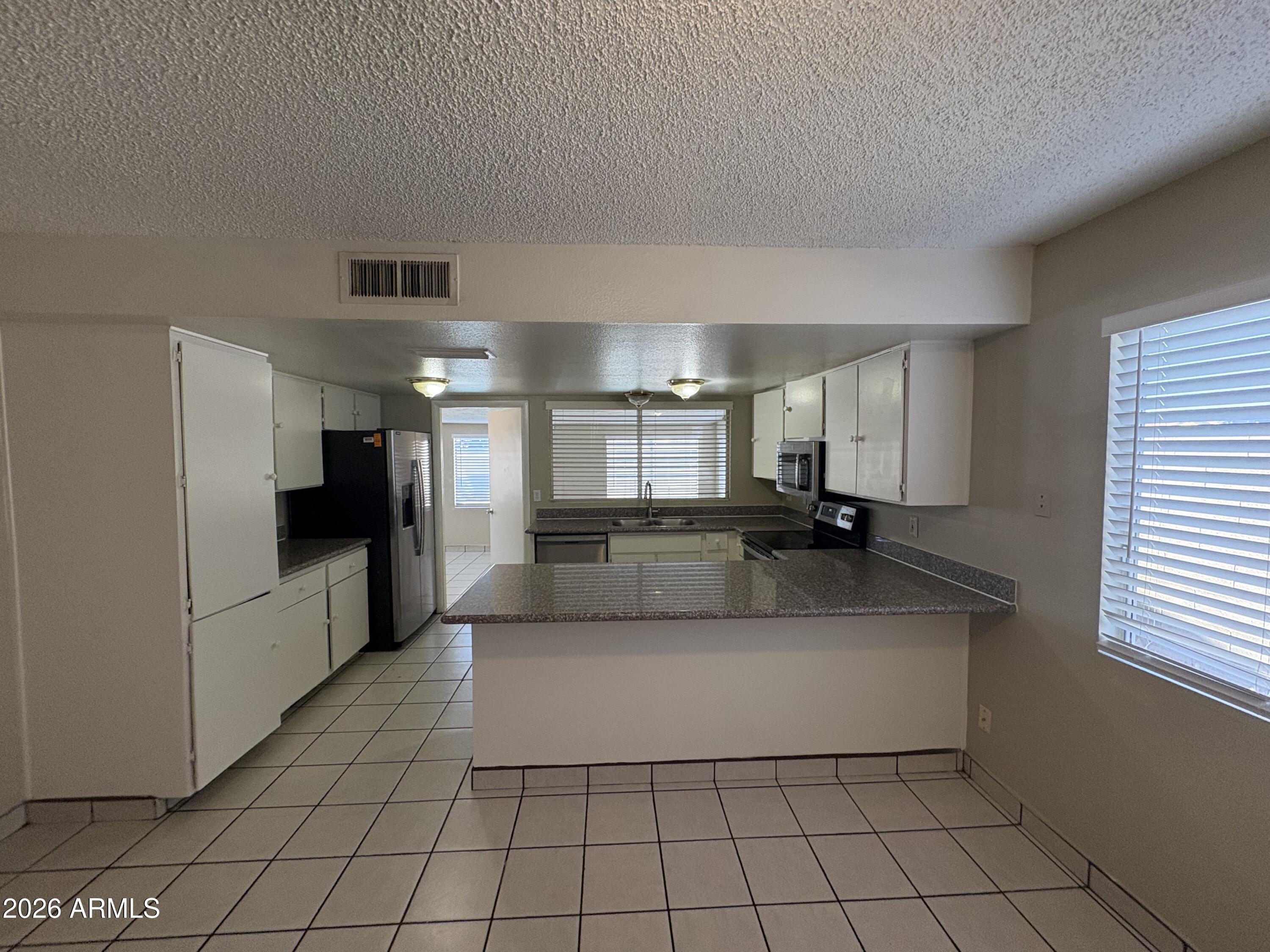 5256 W CHOLLA Street