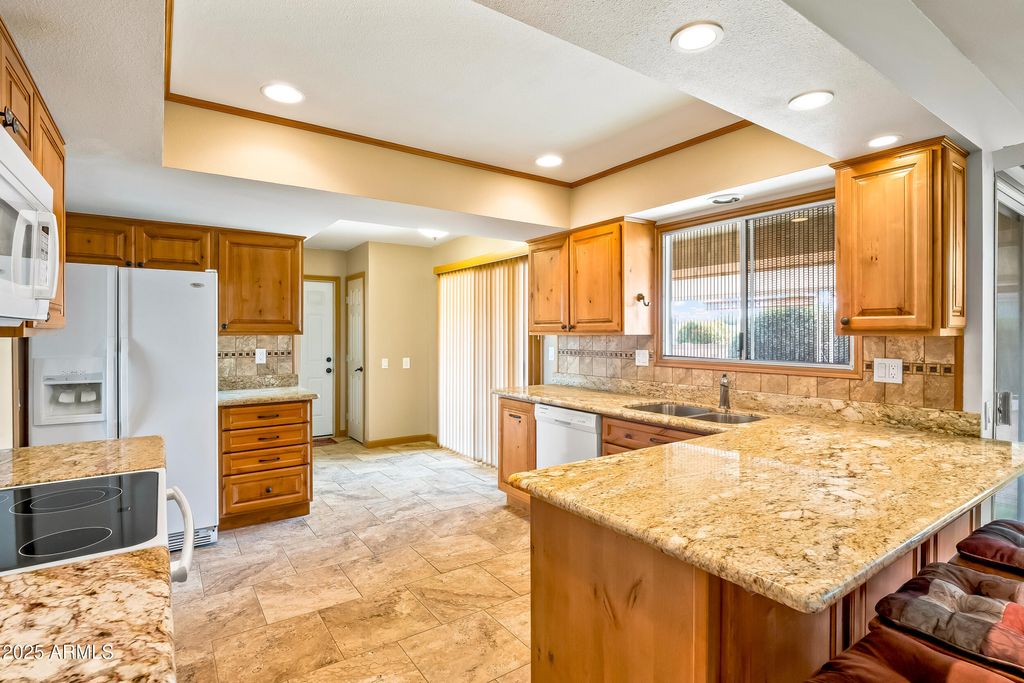 Photo of 17646 N Whispering Oaks Drive, Sun City West, AZ 85375 (MLS # 6913707)