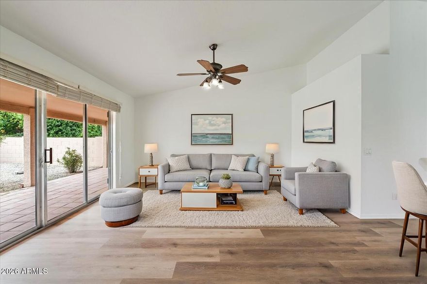 Welcome to easy living in the beautiful active adult community of Sun Lakes, located within the desirable Ironwood Country Club. This popular 2-bedroom, 2-bathroom home offers 1,540 square feet floor plan is move-in-ready and ready for you to enjoying the best of Arizona's lifestyle.

Step inside to find brand-new luxury vinyl plank flooring laid throughout the home, giving the space a fresh, modern feel. The interior has been recently updated with a fresh coat of paint, creating a bright and welcoming atmosphere from the moment you walk in. The kitchen features new stainless steel appliances, making it both stylish and functional for everyday living or entertaining guests. Outside, you'll appreciate the private backyard which is perfect for relaxing with your morning coffee, enjoying the Arizona sunshine, or hosting friends and neighbors.

This home's location is hard to beat. It's just a short walk to the golf course, two community pools, and popular pickleball courts, making it easy to stay active and social.

Living in Sun Lakes means more than just owning a home, it's embracing a vibrant resort-style lifestyle. Residents enjoy access to championship golf courses, fitness centers, tennis and pickleball courts, swimming pools, restaurants, social clubs, and countless activities designed to keep you engaged year-round. Whether you enjoy golf, arts and crafts, fitness classes, or meeting new friends, Sun Lakes offers something for everyone.

If you've been looking for a beautifully updated home in one of Arizona's most sought-after active adult communities, this Ironwood gem is ready to welcome you home.