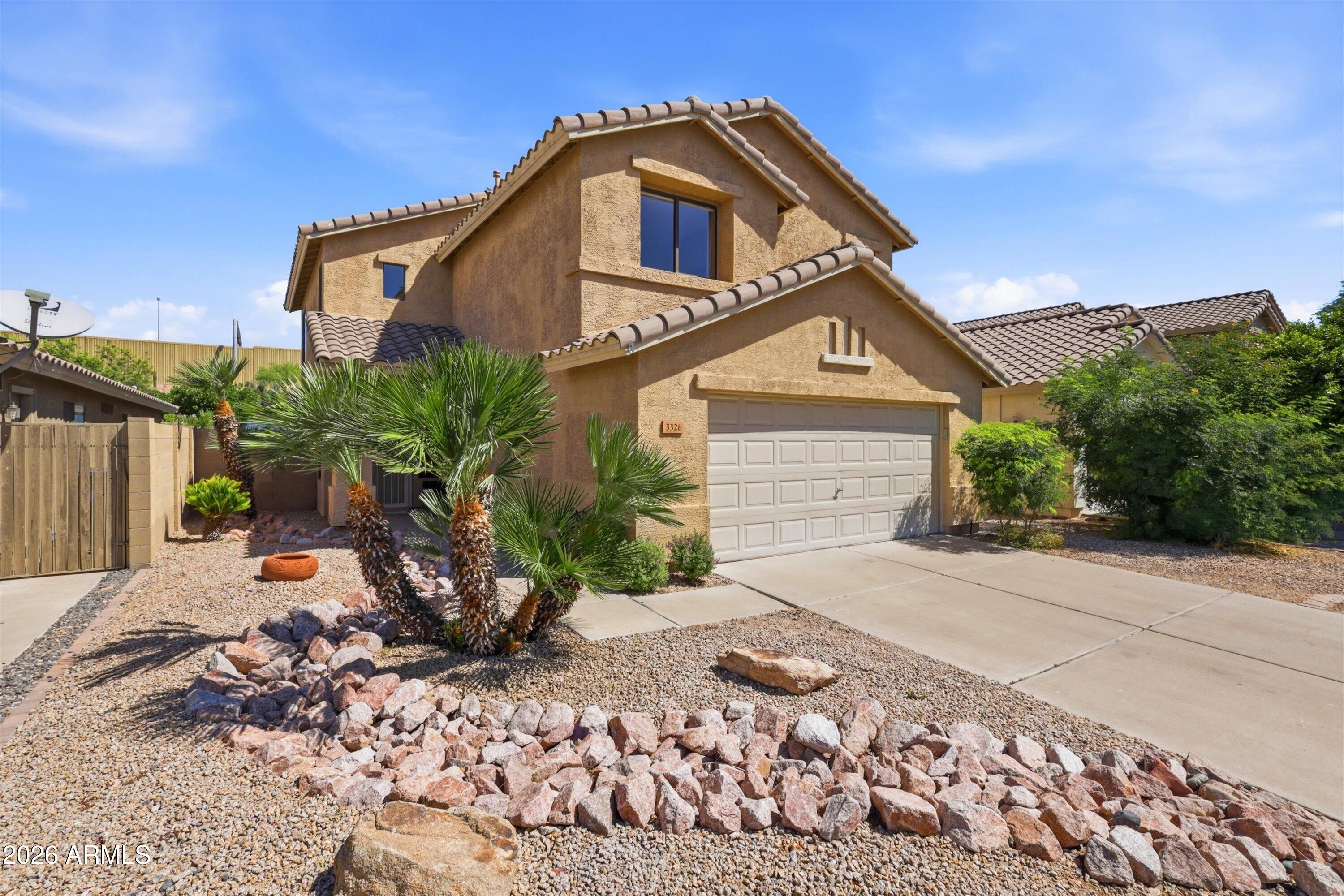 3326 E HONONEGH Drive