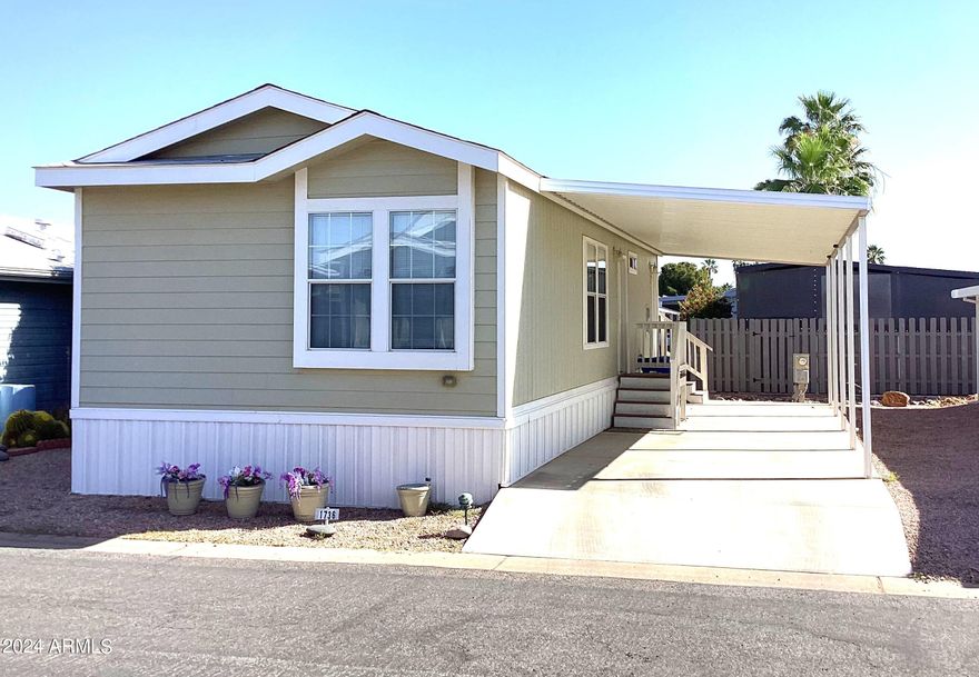 This home is in a premiere age-qualified resort with a plethora of amenities including 3 beautiful swimming pools, 8 lighted tennis courts, a softball field, a putting green, and so, so much more. You're not just buying a home; you're buying a lifestyle! With this recently updated 2015 home you'll have 2 bedrooms, 2 baths in a split floor plan, modern white appliances, vinyl plank flooring throughout and a stacked washer and dryer. Great shopping and dining within 2-3 miles, easy access to Loop 202 or I-60, and 30 mins to Sky Harbor Airport Canyon Lake, or the Renaissance Festival. Seller is owner/agent and may carry, reach out for details.