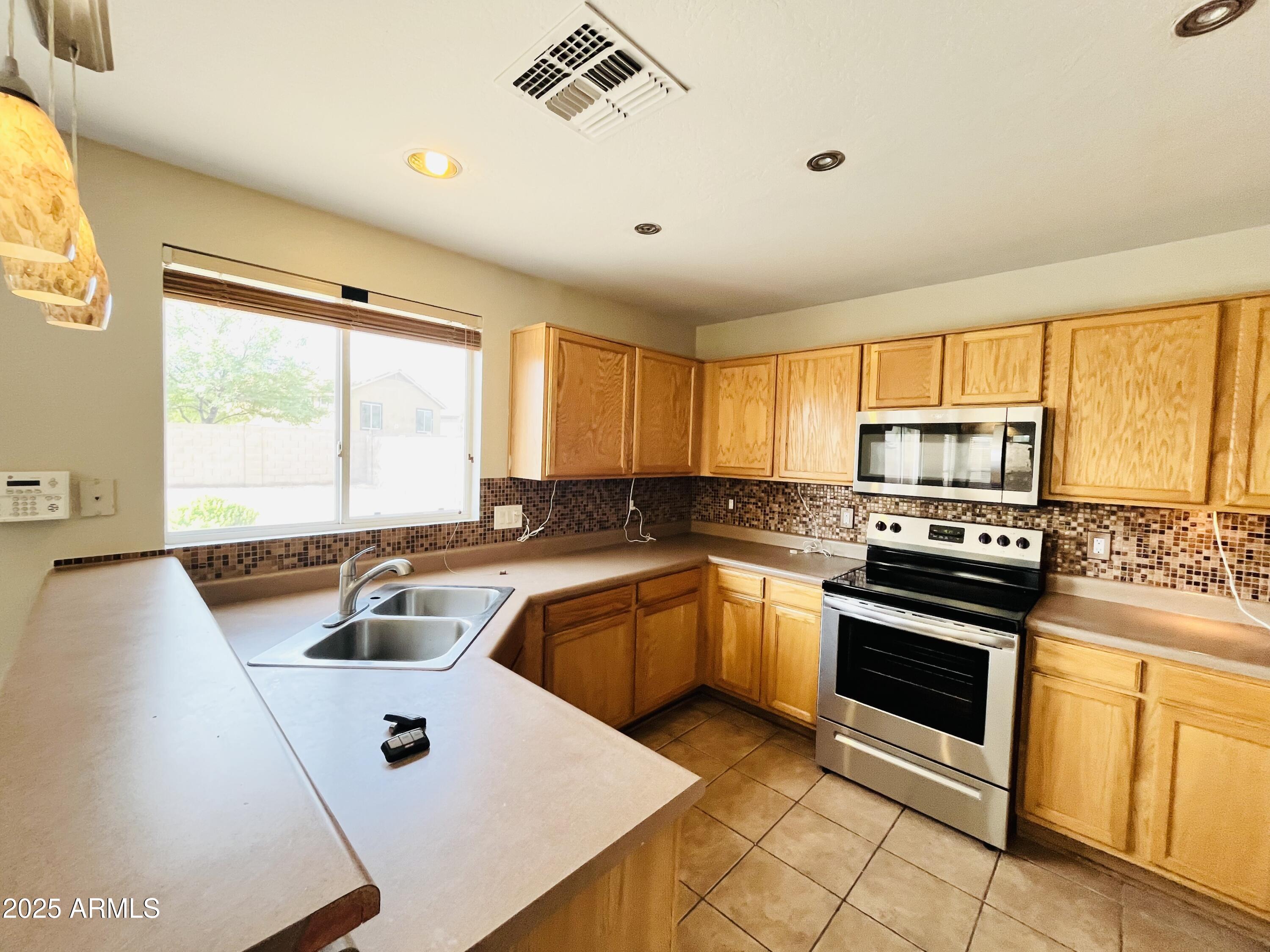 22311 W WOODLANDS Avenue