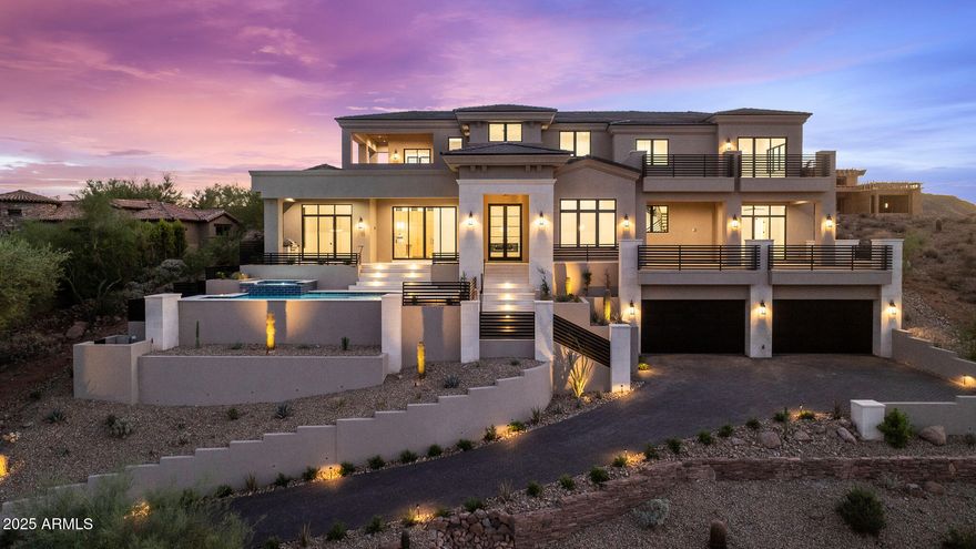 BEST VALUE IN FIREROCK - Gurczak Luxury Development is proud to present this New Construction Formal Mediterranean Spec Home in the Exclusive Guard Gated Community of Firerock Country Club. This 5,607 Sq. Ft. Home Features 4 Bedrooms w/ ensuite bathrooms, a separate powder room which includes an infrared sauna + a separate Den/Game Room. Each room contains a custom ceiling design - Coffered Ceilings, Floating Ceilings & Ceiling Bands. Custom Elevator spans all 3 levels starting from the lower level Garage all the way to the top floor Master Bedroom where you can enjoy Downtown Phoenix & City Light Views. Oversized 4 Car Garage has ample space for all your toys and includes a temperature controlled storage area & separate workshop area.