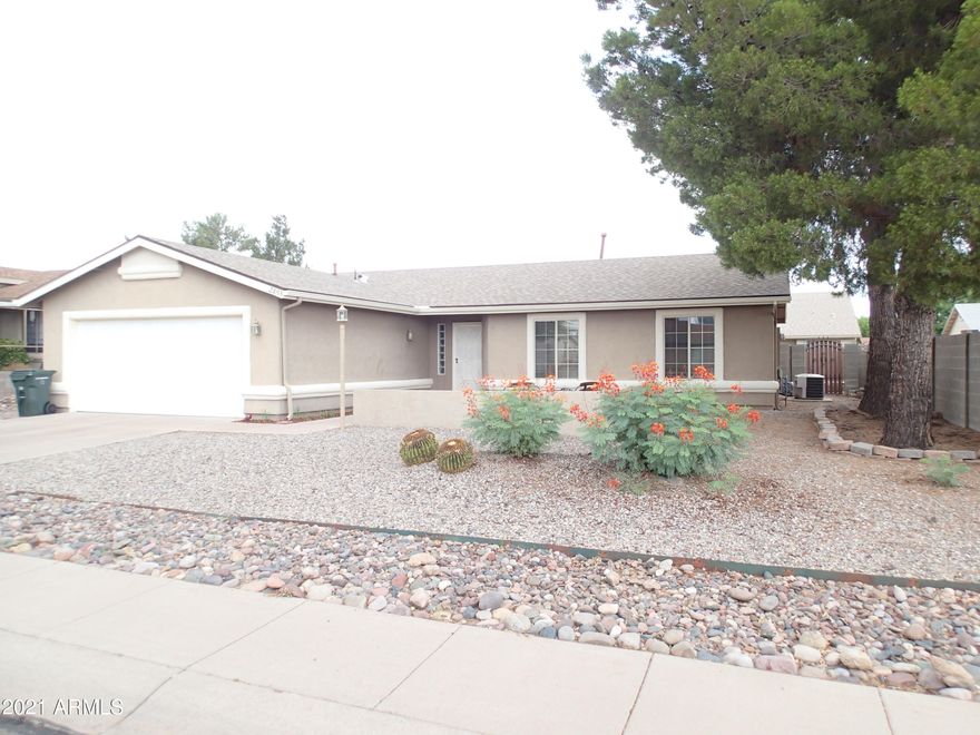 What a Find!! This 3br/2ba/2 car garage has a very open concept with Great room, Dining room and Breakfast area in Kitchen.  Huge Kitchen with Island, lots of cabinet space and Pantry closet. NO CARPET. All Wood Laminate flooring and Tile in wet areas. Master Bedroom and Bathroom  have 36'' doors and step in shower. Walk-In closet, plus bump out giving that extra space.  Back Yard is freshened up with new planting areas, grass, plus Fruit Trees!! Full Block wall and double gate  with parking area for your toys on the side. New roof Jan '20.  Won't Last Long!!! Call for private Showing.