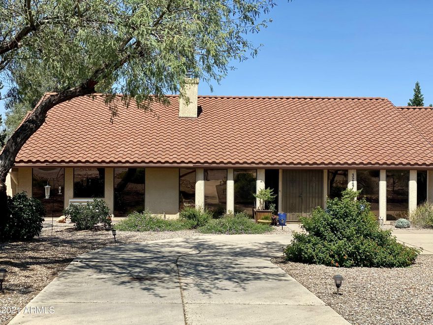 Great home located on 1 acre with beautiful mountain views. 4bed, 3bath home with plenty of space to grow. Large family room with French doors separating bonus/game room. Office/den located off the Master bedroom. Mature trees and large garden.