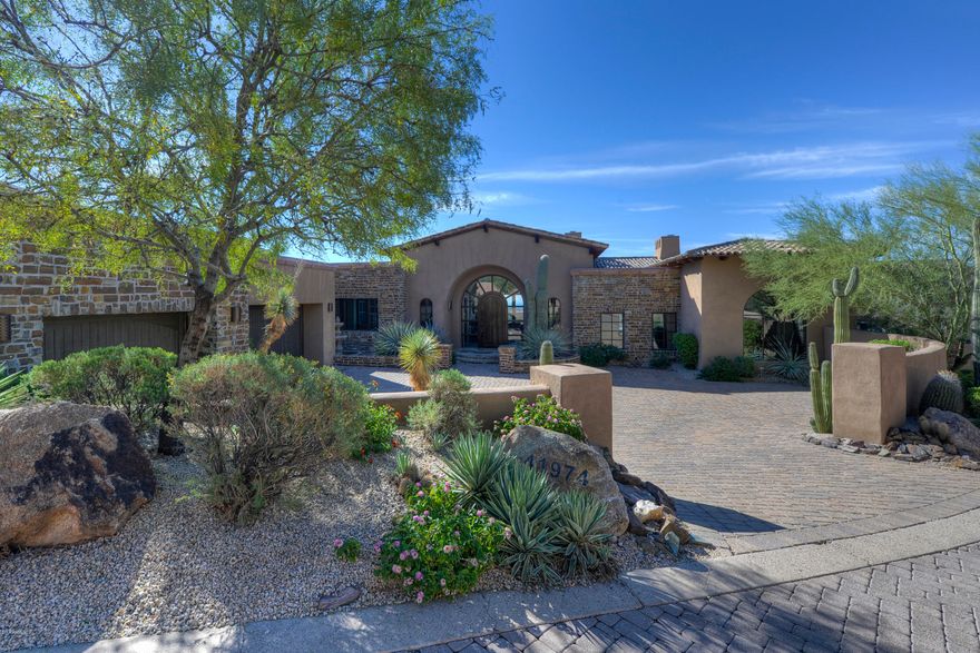 Fabulous Bing Hu European Estate home in Desert Mountain's Saguaro Forest village. Sweeping ridgetop golf, mountain and Valley views from the entire home and resort patio. Single level main home, with lower level billiard room, bar and home theater. Spacious, open great room and expansive covered patios are perfect for entertaining. Gourmet chef's kitchen with amazing custom cabinets, handsomely appointed library and simply elegant master suite.  Finely finished with custom details and quality designer finishes throughout. State-of-the-art Crestron and home automation. Sold completey furnished. All in the fabulous Desert Mountain Club with amenities for the entire active family. Strategically located for proximity to both urban amenities and Arizona's vast outdoor recreational areas.
