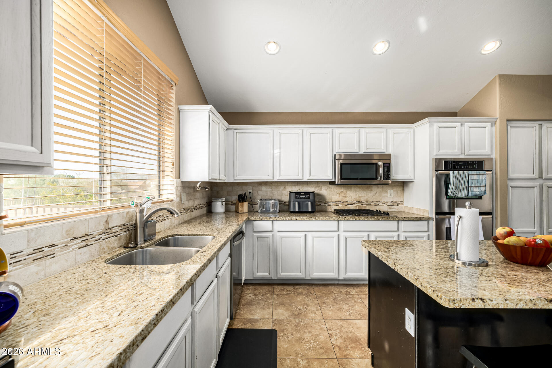 6753 W EL CORTEZ Place