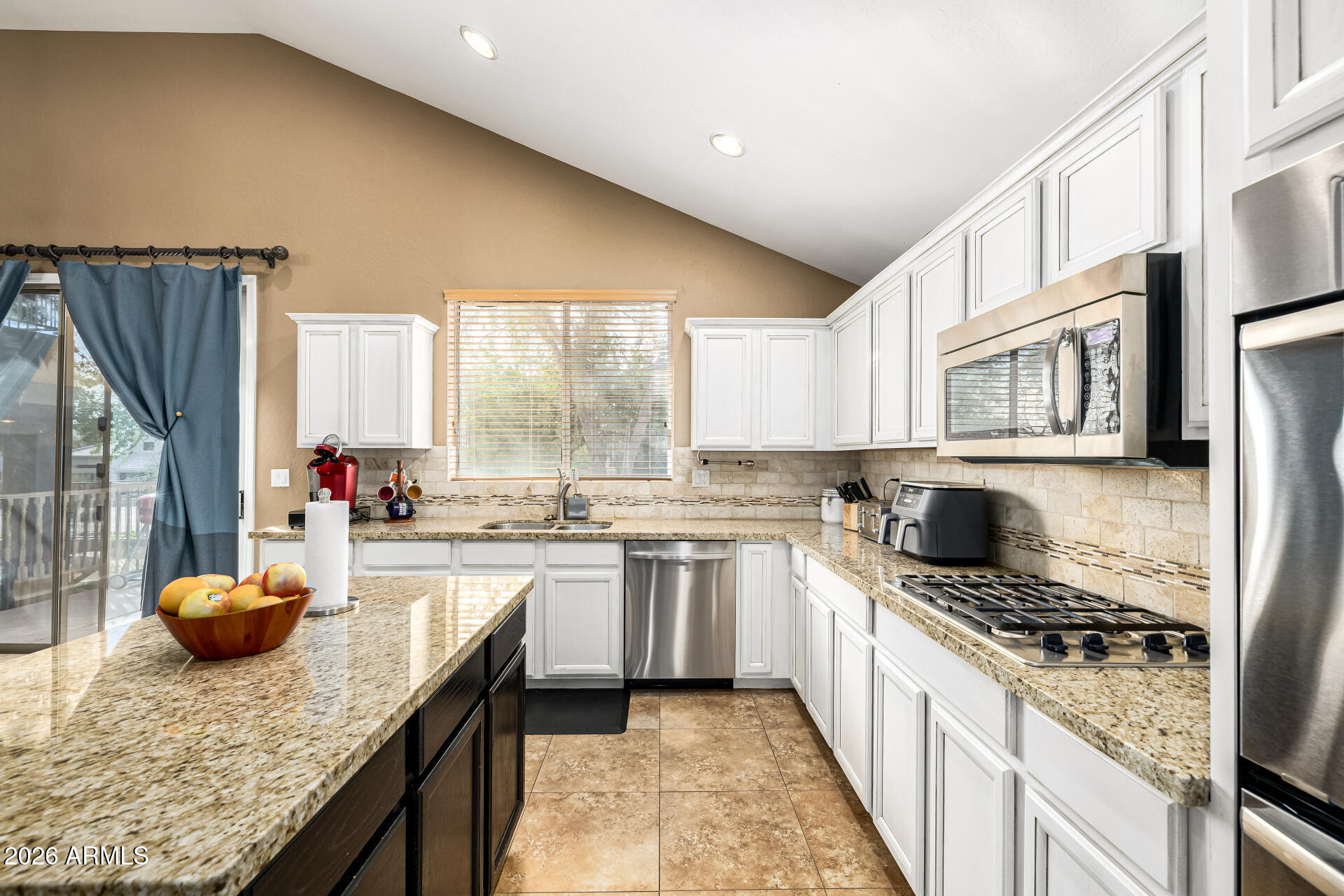 6753 W EL CORTEZ Place