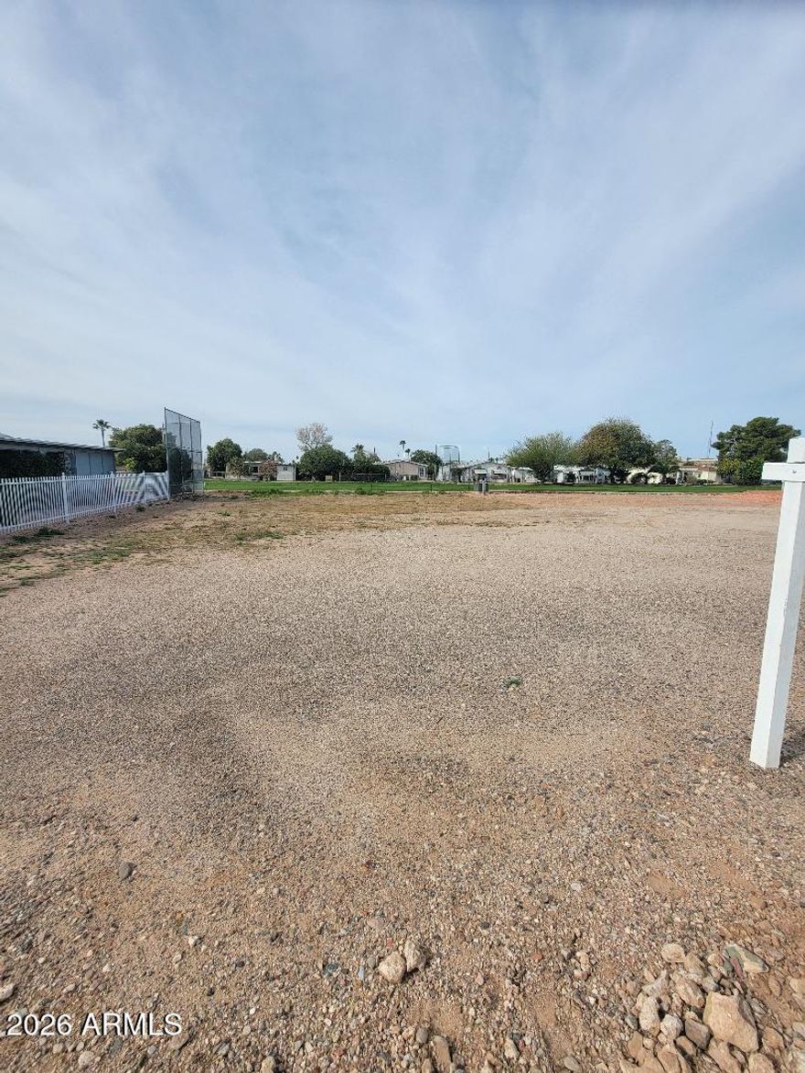 This is an amazing lot on the golf course. An oversized lot with all the utilities to the property. The golf course to the back of the property and views across the street at another area of the golf course. Enjoy the lifestyle of Florence Gardens, where you own the land and have many amenities such as heated pools and spas, pickle ball court, golf course, libraries, craft rooms, work out room,  billiards hall and more!