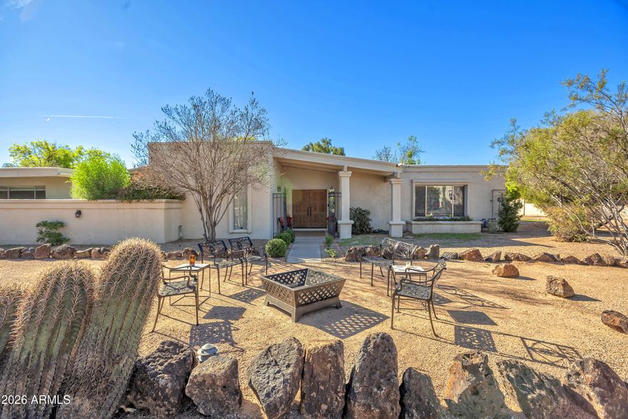 Also for Lease. Lovely light & bright , extremely clean, 4 bedroom, 2.5 bath home on .94 acre in the heart of Scottsdale near Lincoln & Scottsdale Roads.  Open kitchen w/ granite counter tops & stainless steel appliances. Lots of natural light through the large glass doors & windows opening to the large private patio, back yard with pool.  Primary Bedroom suite split with attached office or 4th bedroom.
Family room w/ fireplace. Covered 2 car carport attached to home with storage rooms.  Close to everything Scottsdale has to offer! Walking distance to Hilton Shopping center & so much more! Dogs welcomed upon approval of landlord. New Roof & New AC!. Lease Purchase Option and Seller Carry Back will be considered under right terms.