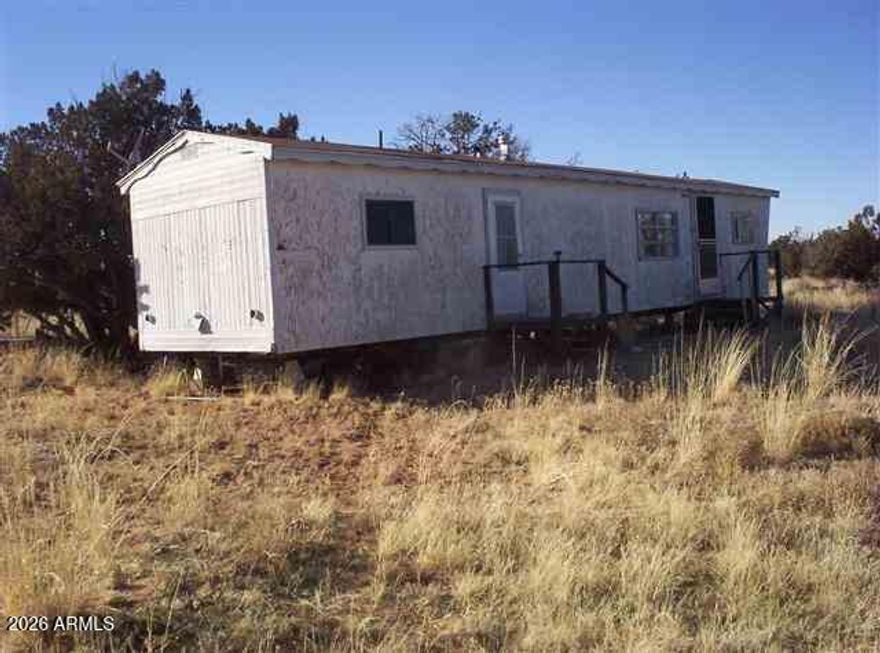 10x50 1962 SPORTCRAFT MOBILE HOME, 1 BDR. (CAN BE 2), 1 BATH ON 10+/-FULLY FENCED ACRES IN CHEV.RETREAT. CONVEY WITH PROPERTY AT NO COST TO BUYER ARE A 1977 KAYOT 5TH WHEEL,A 1974 ''IDEAL'' MOBILE TRAILER, A QUONSET LDG.W/STORAGE
SHEDS.1000 GAL.WATER TANK, A SEPARATE WATER TANK W/TRLR TO HAUL WATER FROM CO-OP WELL. PROPERTY Being SOLD ''AS IS''.