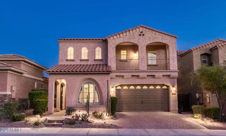 A turnkey Arizona home tucked into a cul-de-sac in gated Sanctuary at Desert Ridge, right next to the neighborhood park. Nearly 4,000 SF with 5 beds/4 baths, office, loft, and a main-level guest suite. The backyard includes a private pool with water feature and a fire pit. Approx. $215K in upgrades reflects far more than cosmetic improvements, including a recently upgraded primary bath, office built-ins, plantation shutters, updated flooring, garage cabinetry, laundry room storage and sink, all adding long-term functionality and thoughtful detail throughout. Just steps to the community park, clubhouse, fitness center, and pool. Outside the gates, Desert Ridge Marketplace, High Street, JW Marriott, shopping, dining, golf and highly rated Paradise Valley schools...your Sanctuary awaits! Described by the sellers as ''our sanctuary within the Sanctuary", the floor plan makes this home feel different from the moment you walk through the front door. Instead of moving directly into the living space, your eye is drawn to the interior courtyard at the center of the home. It softens the transition into the main living areas while bringing natural light into the entry and hallway throughout the day and creating an outdoor space that extends the livability of the home beyond the backyard alone.

Just off the entry and garage access, a built-in drop zone with cabinetry creates an organized transition space for everyday essentials while connecting seamlessly to the main-level bedroom and adjacent bath. The dedicated office features glass doors, dual built-in desks, storage cabinetry, and display shelving, creating a polished workspace with a cohesive custom design.

As the home opens into the main living spaces, large plank tile flooring carries throughout the dining area, great room, and kitchen, creating a cohesive feel across the heart of the home. The kitchen becomes the natural centerpiece, anchored by an oversized island with seating for at least four and surrounded by more cabinetry and counter space than most buyers expect to find. Designed for both everyday living and larger-scale entertaining, it features a gas cooktop with stainless hood, wall oven, eat-in dining area, and a walk-in pantry spacious enough to handle Costco runs, secondary appliances, and the overflow that comes with real life rather than staged living.

At the top of the staircase, a wide landing creates a natural transition into the second level. The laundry room is positioned here as a true utility space with storage cabinetry, sink, and folding counter already built in. Just beyond, the loft functions as a comfortable second living area with direct access to a private balcony large enough for seating and one more place to step outside and enjoy the Arizona evenings. The second level includes two secondary bedrooms and a shared bath, along with a separate ensuite bedroom that offers additional privacy and flexibility for guests. The primary suite has the scale and separation to feel like its own wing of the home. The bath was redesigned with a brand-new walk-in shower featuring a glass surround and dual-entry design, paired with designer tile selections that create a polished, spa-like feel. Quartz countertops, executive-height vanities, and an expansive 15.10 x 11.6 walk-in closet complete the space.

Outside, the backyard was designed for year-round Arizona living with covered and open-air spaces. The pool with water feature and built-in fire pit anchor the backyard, while turf and low-maintenance landscaping create a space that feels polished without requiring constant upkeep.

Within Sanctuary, residents enjoy a gated setting with neighborhood parks, walking paths, a clubhouse with catering kitchen, fitness center, resort-style heated community pool, and annual community events that have helped make the neighborhood one of the most sought-after enclaves in Desert Ridge.

Beyond the neighborhood itself, the location places some of the Valley's most recognized lifestyle destinations within easy reach. Afternoon golf at Wildfire Golf Club, dinner reservations at High Street, weekends at the JW Marriott, shopping at Scottsdale Quarter and Kierland Commons, hiking throughout Reach 11, or evenings in Cave Creek all become part of the rhythm of living in this part of North Phoenix.