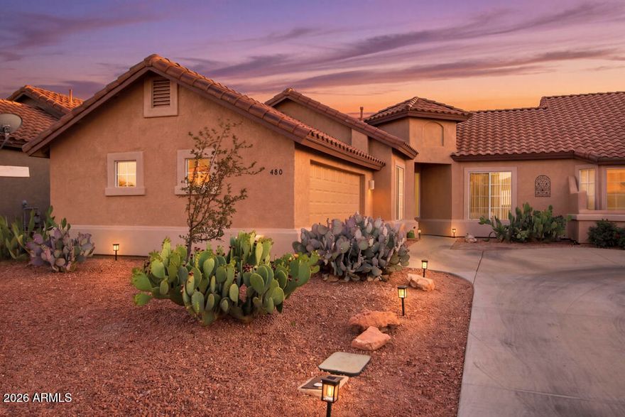 If you desire beautiful panoramic views of Mingus Mountain, a peaceful gated neighborhood, built-in welcoming community vibes with a fabulous Rec Center, salt water pool, spa, gym & golf course...then you have found the one! This well cared for townhome in the gated subdivision of Villas at Verde Santa Fe has upgrades that cover a new roof, fresh exterior paint, new bathroom fixtures, a whole house water filtration system, plus a low maintenance turfed back patio with a drip system. This is a home centered around the Great Room with vaulted ceilings, a welcoming natural gas fireplace & located on a cul de sac, and backs right up to the golf course with the vista of the stunning Mingus Mountain range as your backdrop. As part of your HOA dues, you have a salt water pool just across the gated road for private community use, plus landscaping maintenance of your front yard, and use of the large community clubhouse for your own private events, plus the myriad of hosted community events. There is a hiking trailhead right at the edge of the community, the local Cornville Farmer's Market held weekly is just a few miles down the road, and Sedona is less than twenty minutes' drive. 55+ community, no nightly STR allowed, furnishings negotiable.