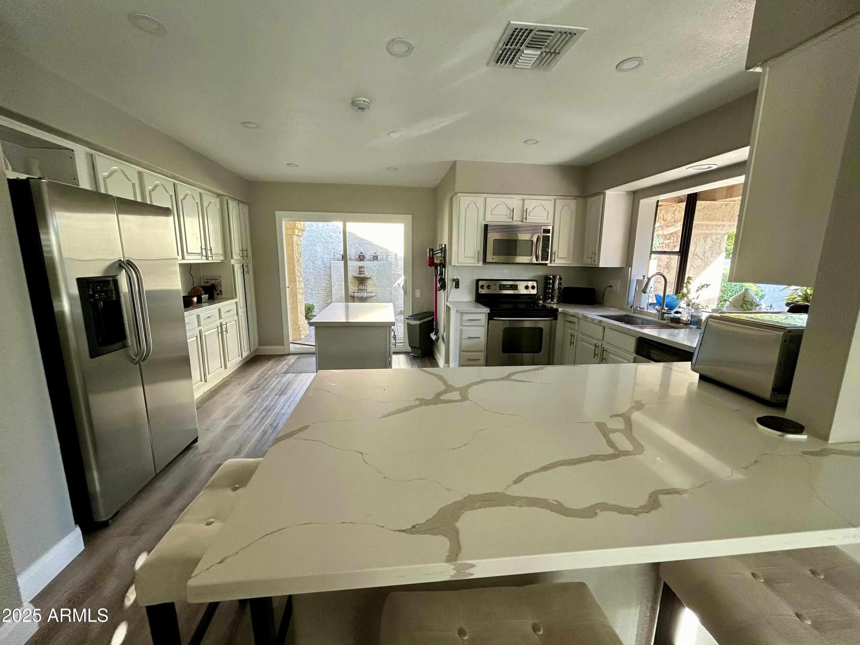 9991 E PURDUE Avenue