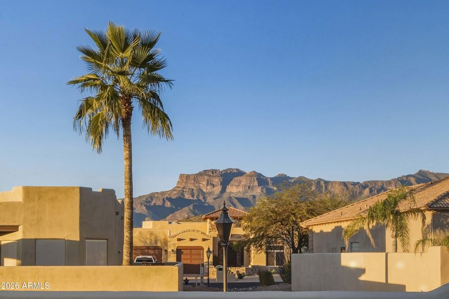 Built in 2019 and truly move-in ready, this stunning home is tucked inside a double-gated community and showcases breathtaking Superstition Mountain views you'll never get tired of. Designed with modern living in mind, the home features contemporary finishes throughout and an open, light-filled layout.
Step outside to your private backyard oasis, complete with a beautiful salt pool and irrigated turf--perfect for staying cool and enjoying Arizona's hot summer days. The property also offers an RV gate, a spacious 2.5-car garage, central vac, and brand-new insulated garage doors for added efficiency and comfort. Inside, upgraded Anderson sliding doors seamlessly connect indoor and outdoor living, enhancing both style and functionality.