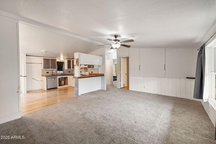 Charming and spacious 3-bedroom, 2-bath manufactured home on .28 acres with no HOA. Ideally located just half a mile from beautiful West Clear Creek, this property offers the perfect blend of comfort, freedom, and outdoor lifestyle. Enjoy a bright, open layout, stylish shiplap accent wall, and plenty of space inside and out. A versatile workshop and ample room for toys, trailers, or recreational gear make this an excellent full-time residence, getaway, or investment opportunity.