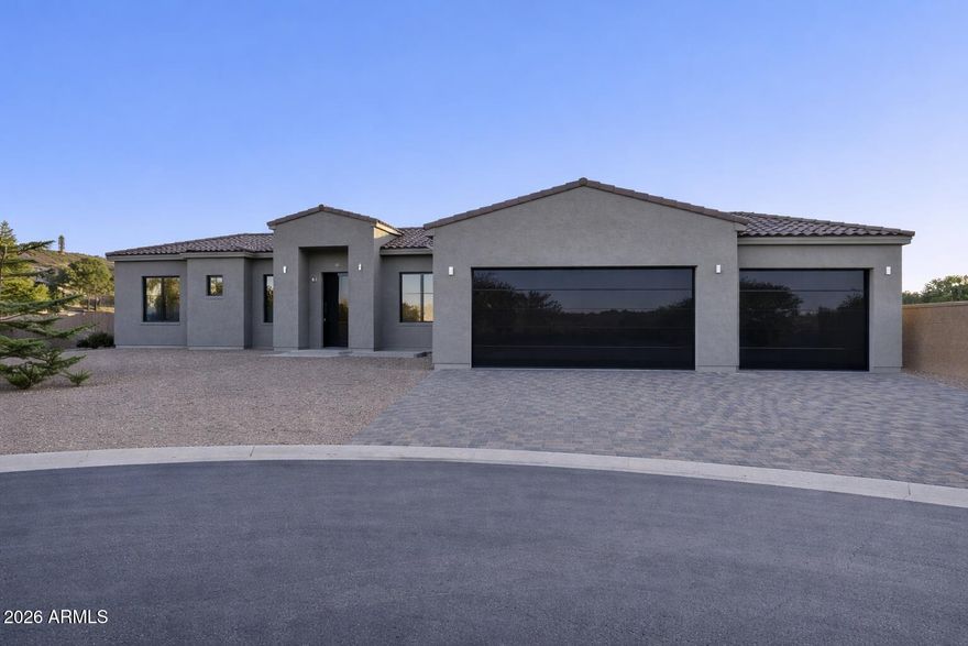 Luxury New Construction with Expansive Outdoor Potential in Fountain Hills
Nearly complete and just under 4,100 sq ft, this exceptional new-build residence is tucked away on a ½-acre cul-de-sac lot, offering privacy, space, and refined modern living in one of Fountain Hills' most sought-after settings.
Designed with a split floor plan, the home features 4 bedrooms and 3.5 baths, creating a seamless balance between open gathering spaces and private retreats. The grand great room is anchored by soaring vaulted ceilings, filling the home with natural light and creating an inviting atmosphere for both relaxed evenings and elevated entertaining.
The kitchen and living spaces are thoughtfully curated with sleek linear cabinetry, Monte Blanc quartzite surfaces throughout, and engineered wood flooring that adds warmth and continuity. Custom closets provide tailored storage solutions, blending form and function with understated elegance.
Outdoors, the expansive lot invites imagination  envision resort-style pool days, a private guest house for visitors, or a sport court for year-round recreation. With ample space to design your ideal outdoor retreat, this property offers a rare opportunity to create a truly personalized lifestyle.
A striking combination of modern design, generous scale, and future potential  this nearly completed luxury home is a must see.