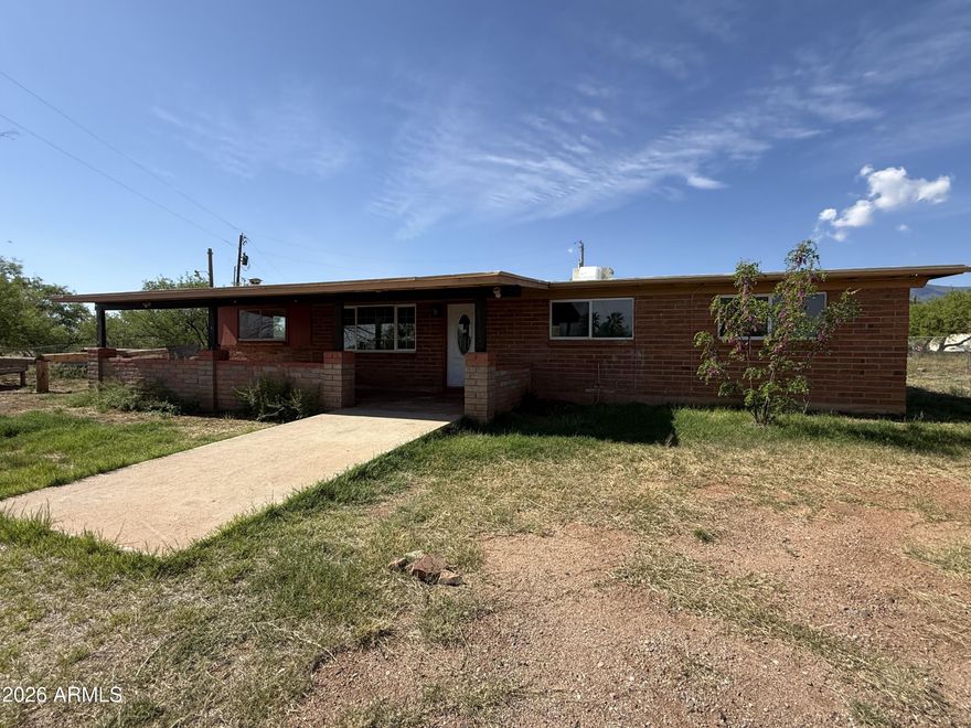 This cute home is just waiting for new owners! The home features a living AND family room, large utility room and 3 bedrooms! There are 2 walk in closets. There were recent updates inside. Newer flooring as well. There is a fenced back yard as well as fencing beyond that in the back. Do not miss this great opportunity!