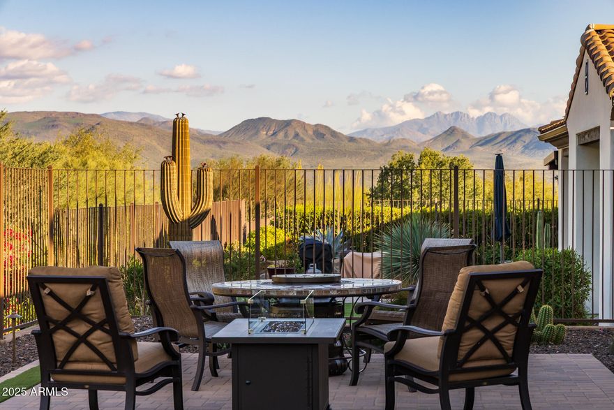 Welcome to this beautifully enhanced Latigo floorplan including an office and private casita, all designed to capture stunning mountain views. With no homes directly behind, you'll enjoy unobstructed mountain vistas and breathtaking sunrises and sunsets in complete privacy. Begin in the charming front courtyard and step inside to an open, light-filled interior featuring white cabinetry throughout, newer carpeting, and shutters and electric shades. The great room impresses with a stone entertainment wall with accent lighting, surround sound, and a picture window framing the mountains. The kitchen is stunning with stainless steel appliances, granite countertops, and a spacious island with a breakfast bar. The dining area features custom cabinetry and two wine refrigerators. The primary suite includes a soaking tub, oversized shower, dual sinks, and a walk-in closet. The separate casita with full bath offers comfort for guests or flexible use. Additional upgrades include designer wallpaper in the powder room, an AC-cooled garage and a freshly painted exterior. Outside, the backyard offers beautiful mountain views and a covered patio featuring a custom stone fireplace, ideal for relaxing or entertaining year-round. Do not miss out on this beautiful home!

The amenities at Verde River are World Class with Tom Lehman inspired eighteen-hole Golf course, tennis courts, pickleball courts, and bocce ball, heated lap pool and Resort style swimming pool, hot tub, Afterburn fitness center, Helen's demonstration Kitchen for cooking classes and a 7.5 acre dog park. The community center has casual poolside dining at Eddy's Diner and gourmet dining at award-winning Needle Rock Kitchen and Tap, Alvea Spa with full-service Salon and Spa amenities, Art Loft and events center. Trilogy at Verde River is adjacent to the Tonto National Forest and is situated in the middle of miles and miles of hiking and biking trails.