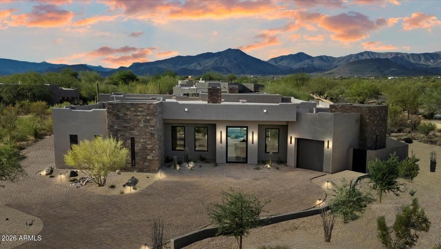 Newly completed modern estate offering exceptional privacy and a beautifully appointed detached guest casita, included in the nearly 5,000 sq ft of light-filled contemporary design. The home features soaring ceilings, expansive walls of glass, and effortless indoor-outdoor living.

The resort-style backyard is designed as a true private retreat, complete with a sparkling pool and spa, generous covered patios, and curated low-maintenance desert landscaping--perfect for both relaxed everyday living and elevated entertaining.

Inside, the chef's kitchen showcases premium appliances, an oversized island, and warm modern finishes that balance sophistication with livability. The primary suite is a serene sanctuary, offering spa-inspired design and a custom-designed closet with refined detail The detached guest casita enjoys its own private entrance and features a stylish bath along with a well-appointed wet bar including beverage refrigeration, ice maker, and microwave--ideal for visitors, extended stays, multigenerational living, or an executive office retreat.

Constructed with enhanced insulation and energy-efficient systems for quiet, comfortable living, this residence is located within a gated North Scottsdale community near world-class golf, dining, and outdoor recreation.