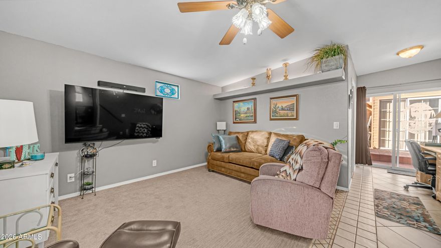 This is the one you have been waiting for. As you arrive you immediately notice how meticulously maintained it is, starting with the epoxy coated carport, newer window awnings, & updated heating & cooling system that give you peace of mind from day one. Step inside to vaulted ceilings & beautiful wood look laminate flooring that carry throughout the home, creating a bright open feel. The kitchen is thoughtfully designed with upgraded appliances including a full size flat top stove & microwave, pantry storage, upgraded sink fixture with garbage disposal, & even a water softener to make daily living easy. Dual pane windows with curtains & blinds allow in plenty of natural light while adding efficiency. In the bedroom you will find mirrored closet doors, built in drawer storage, & a high end electric adjustable queen size bed for ultimate comfort. The master bath features a walk in shower & tile flooring, while the hall offers a bonus linen closet for extra storage. Head into the spacious Arizona room where custom tiled stairs lead you into a bright inviting space with sliding doors at both the front & back, perfect for relaxing or entertaining. The second bathroom includes floor to ceiling cabinets that provide incredible additional storage. This home comes complete with laundry & everything you need to start enjoying immediately. Located in Golden Vista, you will have access to outstanding amenities, endless activities, & the perfect setting to soak up the Arizona winters & live the retreat lifestyle you deserve.