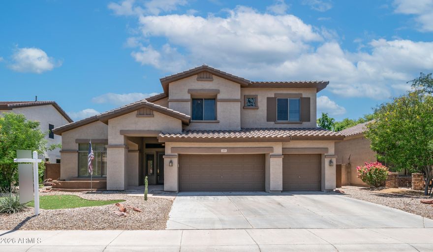 Located in a gated south Chandler community sitting next to Bear Creek Golf course, close to shopping, dining and entertainment.  Featuring an inviting family room with stacked stone gas fireplace; kitchen has island looking into the spacious family room.  Formal living & dining areas for entertaining guests. Newer Roof & AC unit!  Desirable master bedroom downstairs w/ double door entry, a large walk-in shower, dual vanities & walk in closet.  Private laundry room has lots of storage & ironing board. Guests can use the powder room on the main floor.  Upstairs large game room or additional family room!  Nice size secondary bedrooms & bathroom. Amazing backyard featuring pool w/rock waterfall grotto, a hot tub to relax & enjoy after a game of golf or on a cool winter evening. Extended pergola to enjoy the indoor/outdoor lifestyle! Green artificial turf for kids or pets to play.  Enjoy looking out to the view fencing that gives the large backyard an even larger feel with green grass and mature trees and shrubs!  This is a desirable community with great schools. It's located next to the 6.5-mile Paseo Trail featuring a 10-foot-wide concrete multi-use pathway on the eastern side of the Consolidated Canal. The western side of the canal is an unimproved dirt surface that can be used for horseback riding or bicycling. It has become very popular with walkers, joggers, stroller-pushers, bicyclists, and even horseback riders on the west side of the canal that the City of Chandler maintains.
