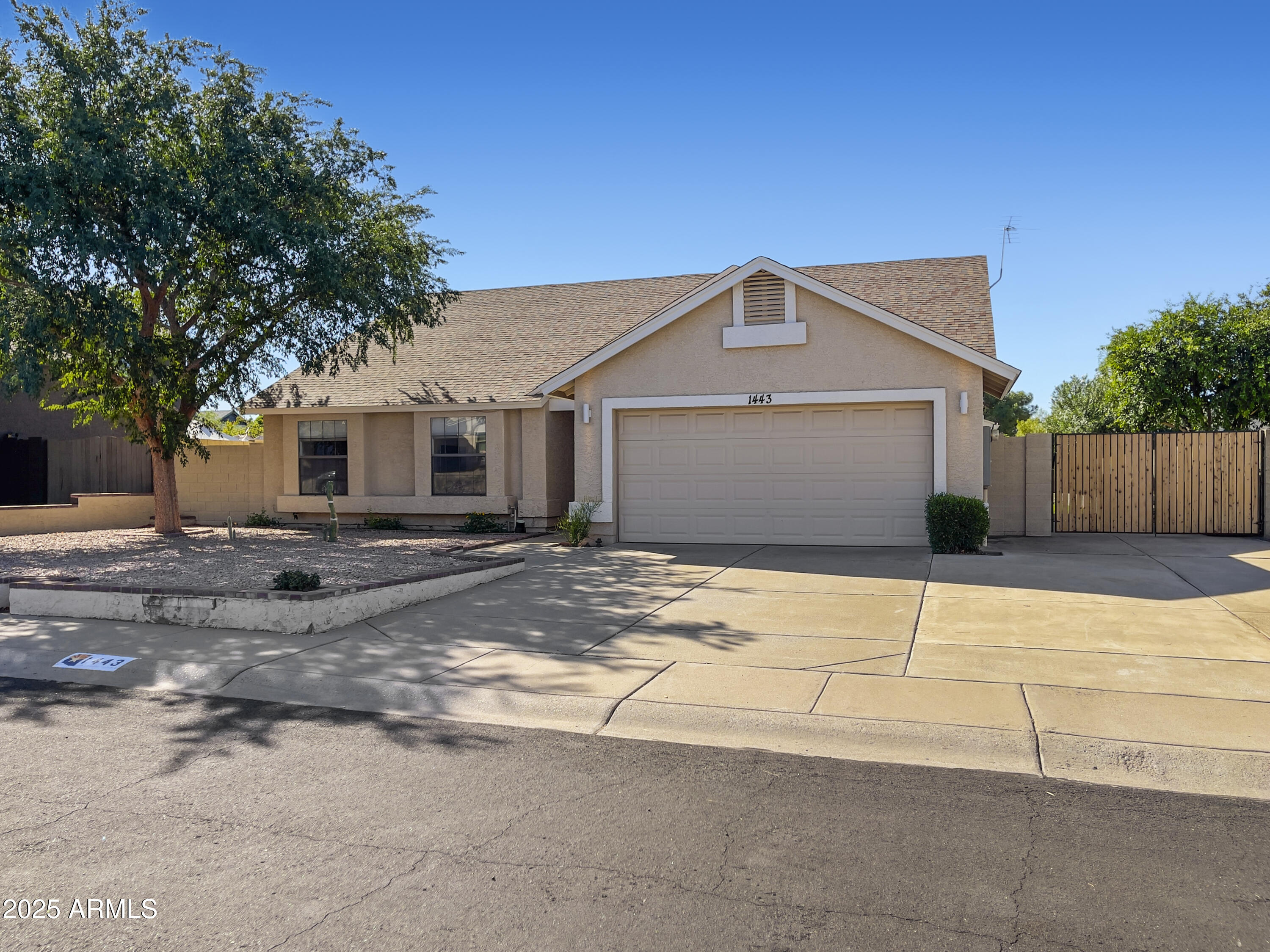 1443 E WICKIEUP Lane