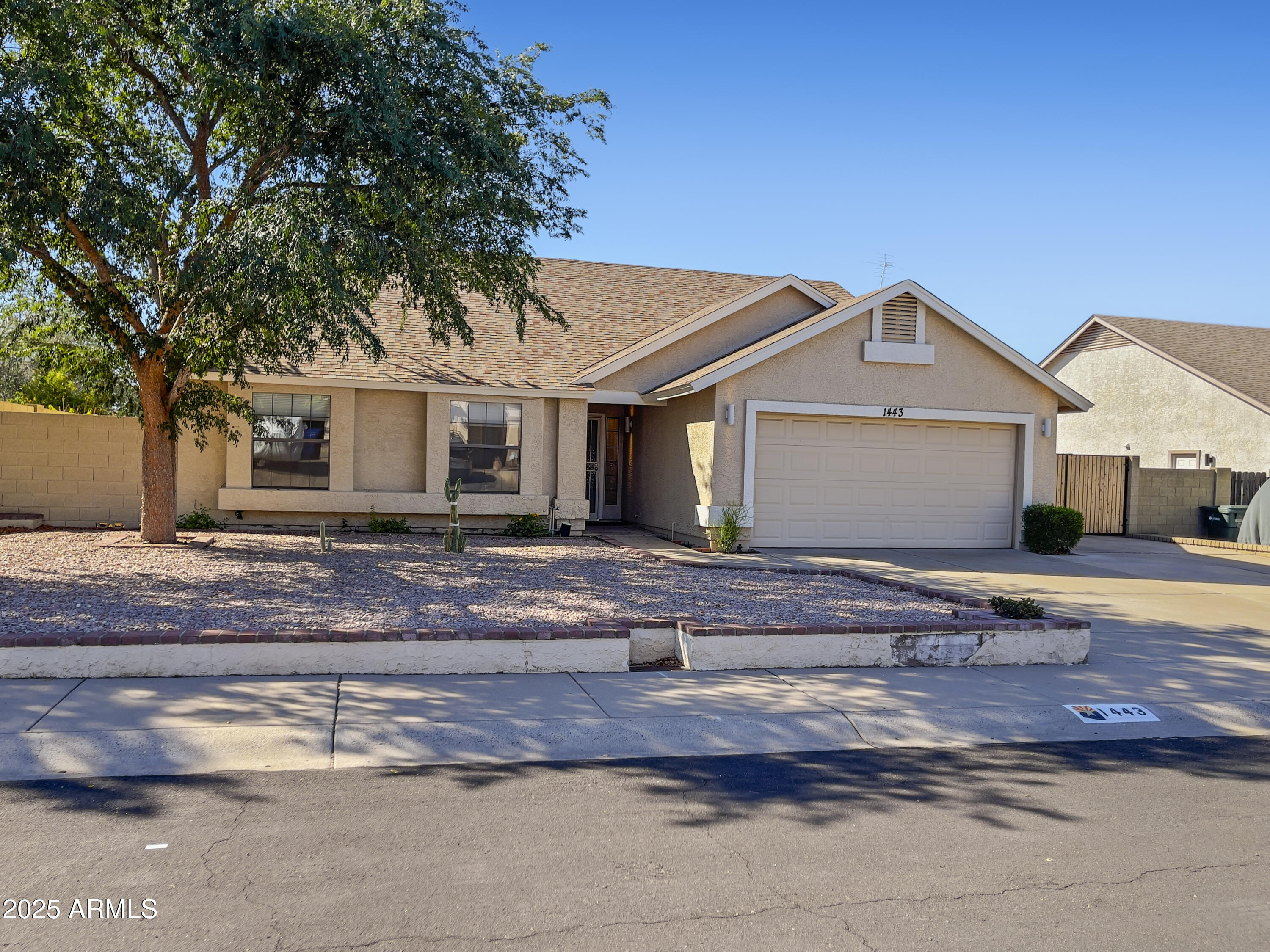 1443 E WICKIEUP Lane