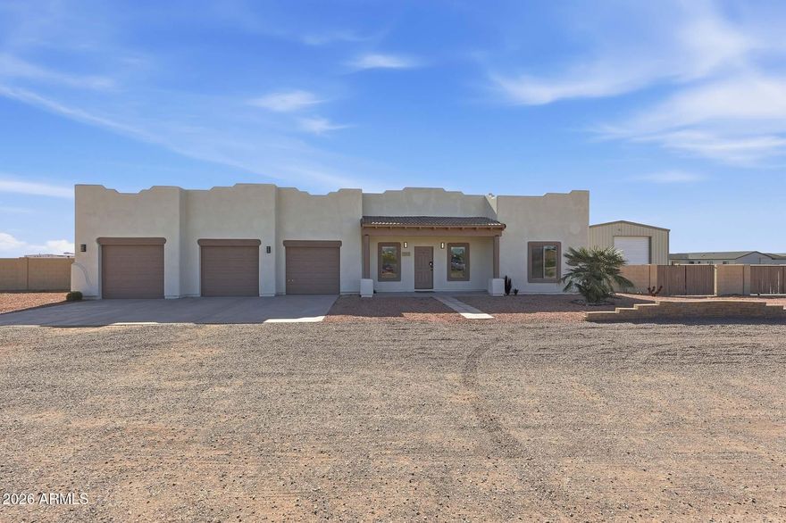 This beautiful 2x6 construction home has 4 bedrooms, 3.5 bathrooms and bonus room. Sale includes 2 fully fenced one acre parcels, number 503-48-018Q and 503-48-738D, each with its own shared well. The kitchen features granite countertops and an extra-large walk-in-pantry. Enjoy an oversized laundry room, double walk-in master closets, updated bathroom countertops and fixtures, brand new carpet, and upgraded 400 amp service panel. Property includes a 30x50x16 insulated shop with  power and RV electrical hookup. Second acre includes 3 covered horse stalls.